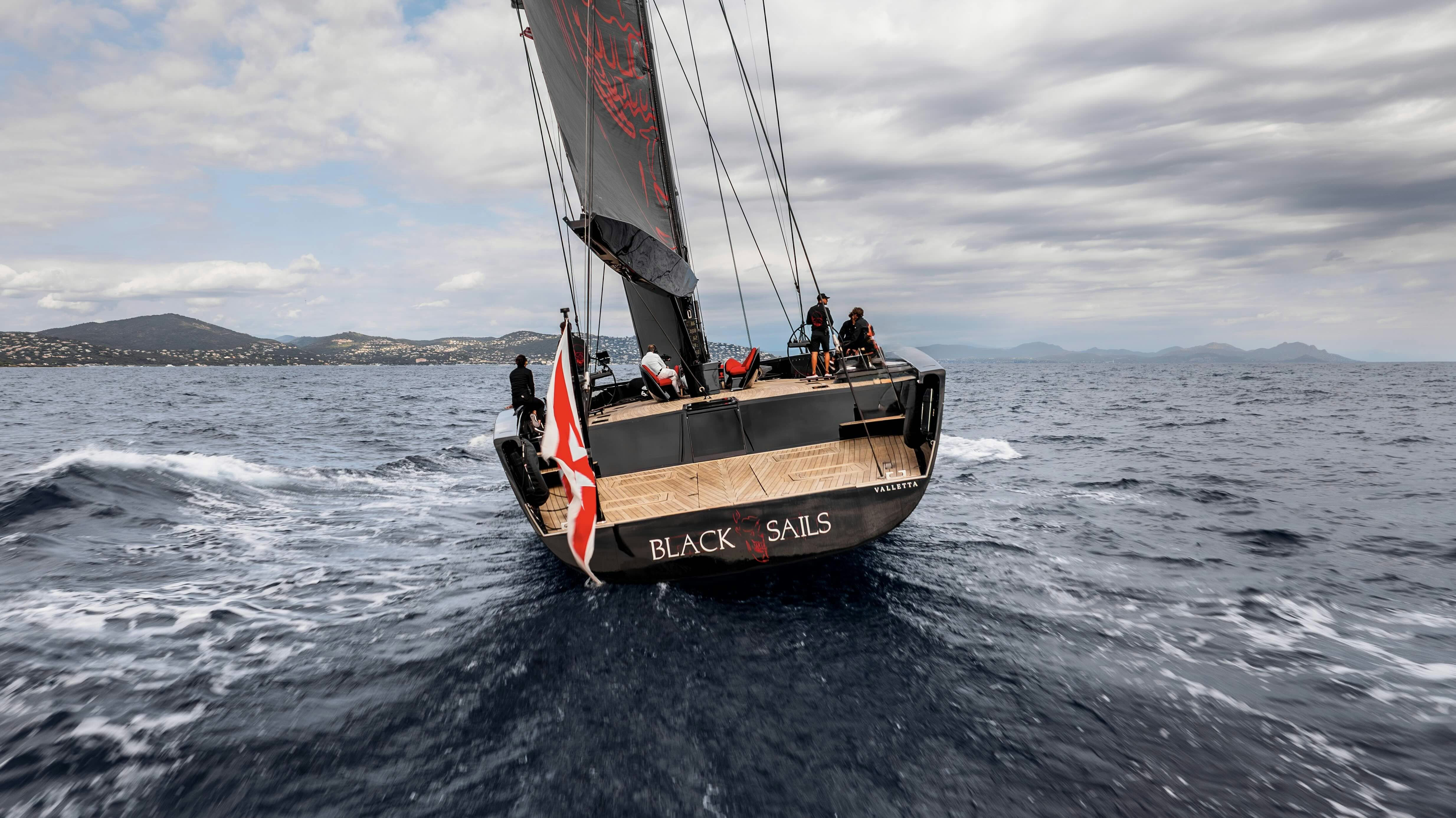 a boat sailing on the sea aboard BLACK SAILS Yacht for Sale