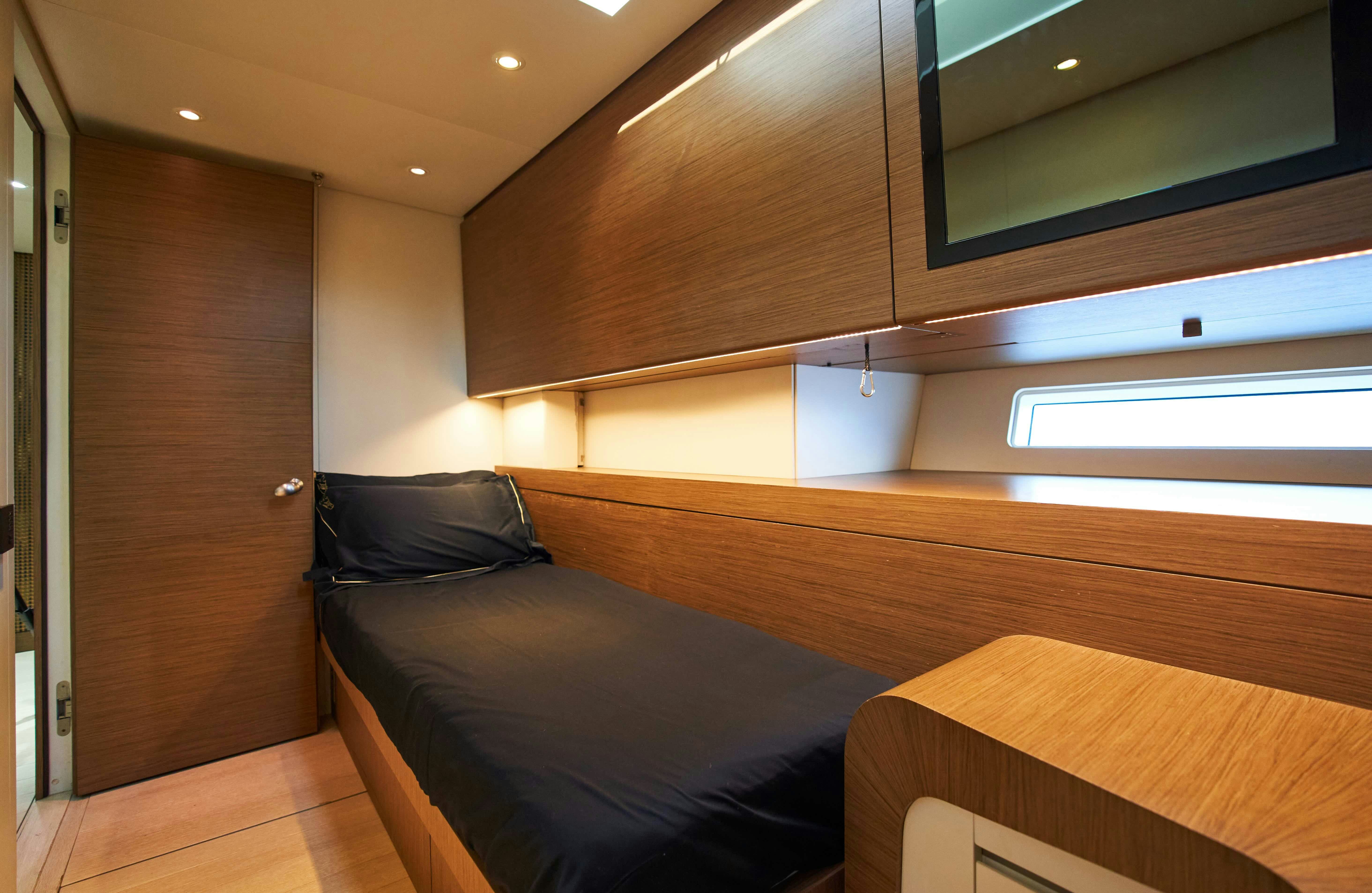 a bed in a room aboard BLACK SAILS Yacht for Sale
