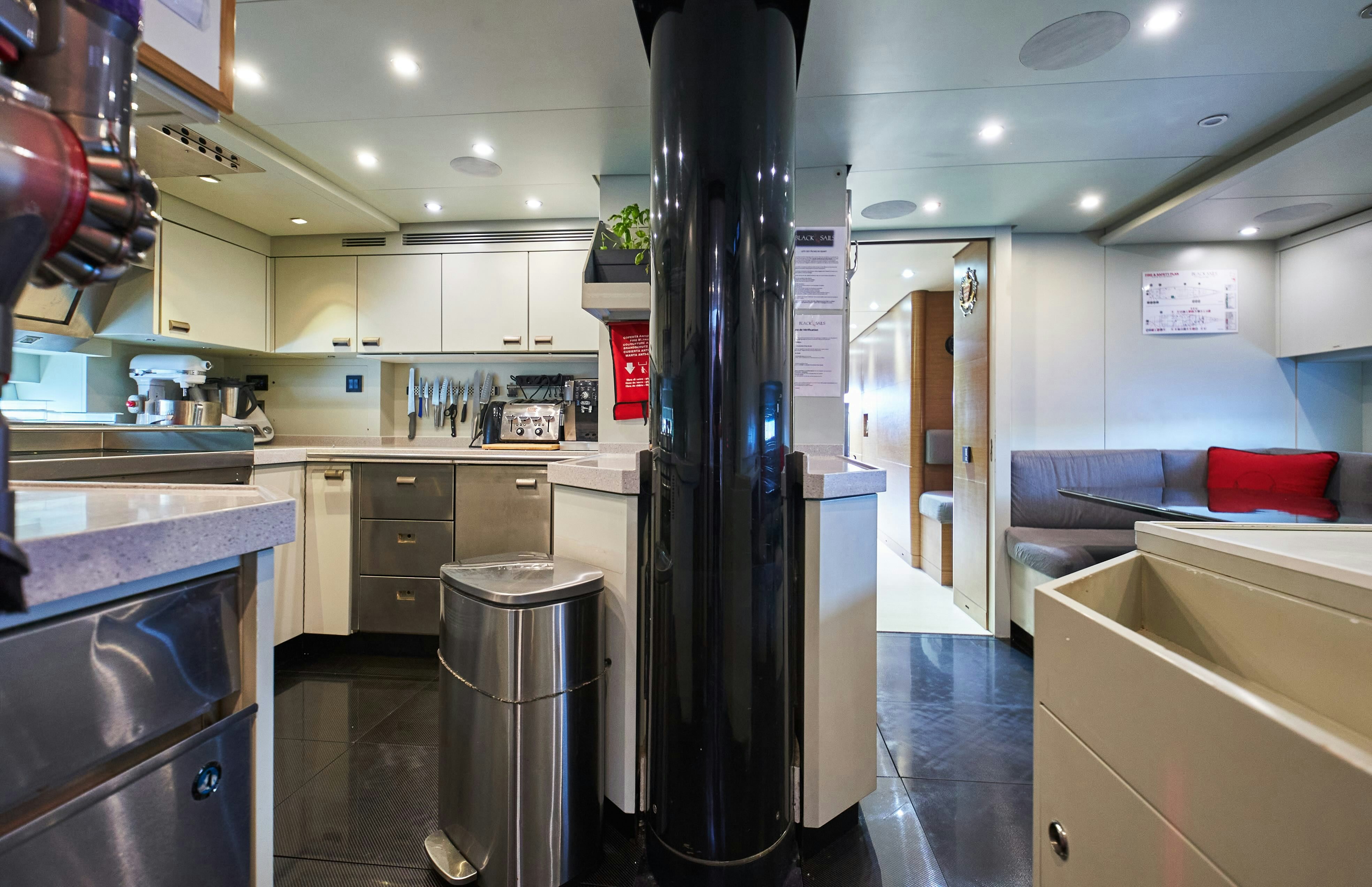 a large black pipe in a kitchen aboard BLACK SAILS Yacht for Sale