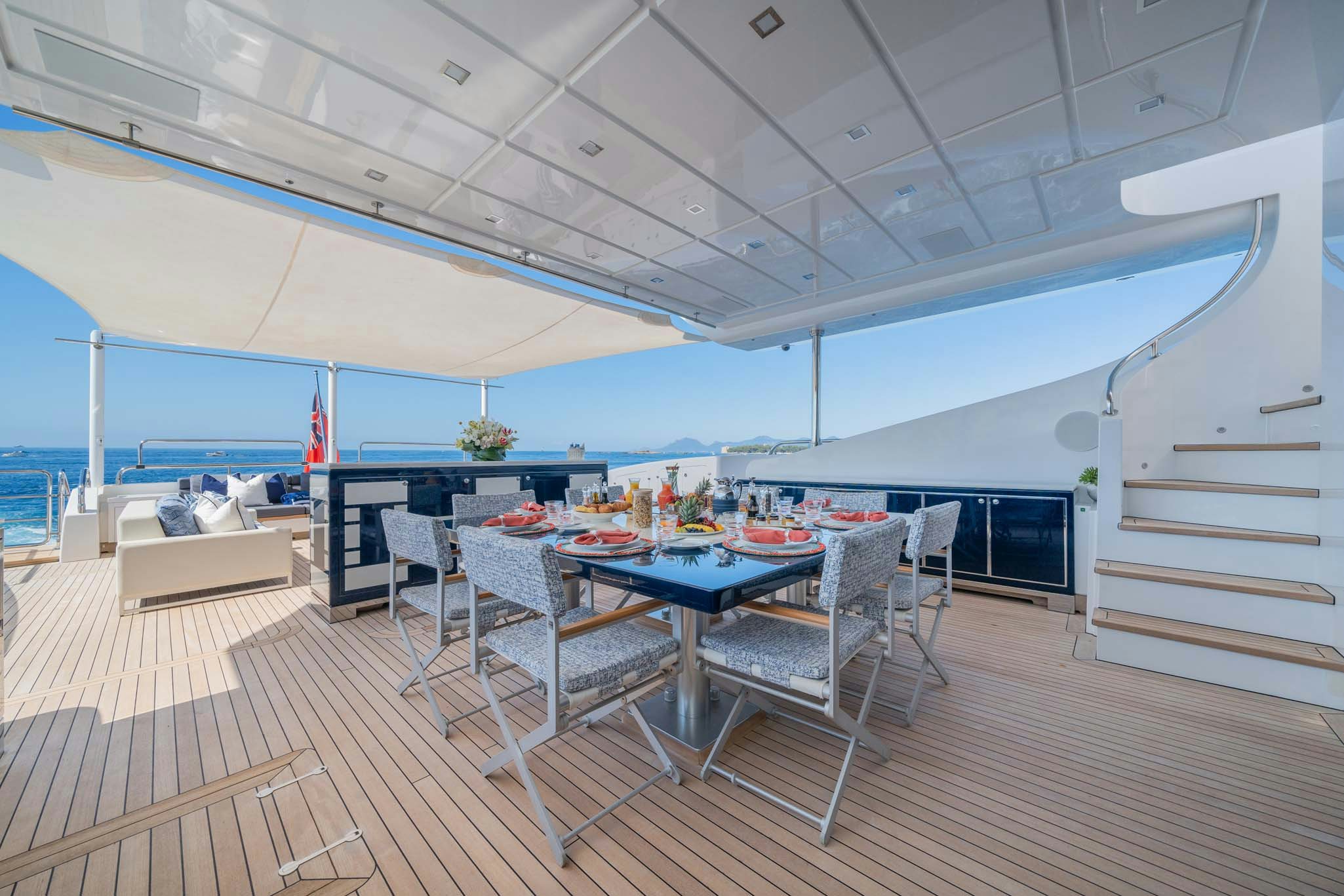 a room with a table and chairs aboard DA VINCI Yacht for Charter