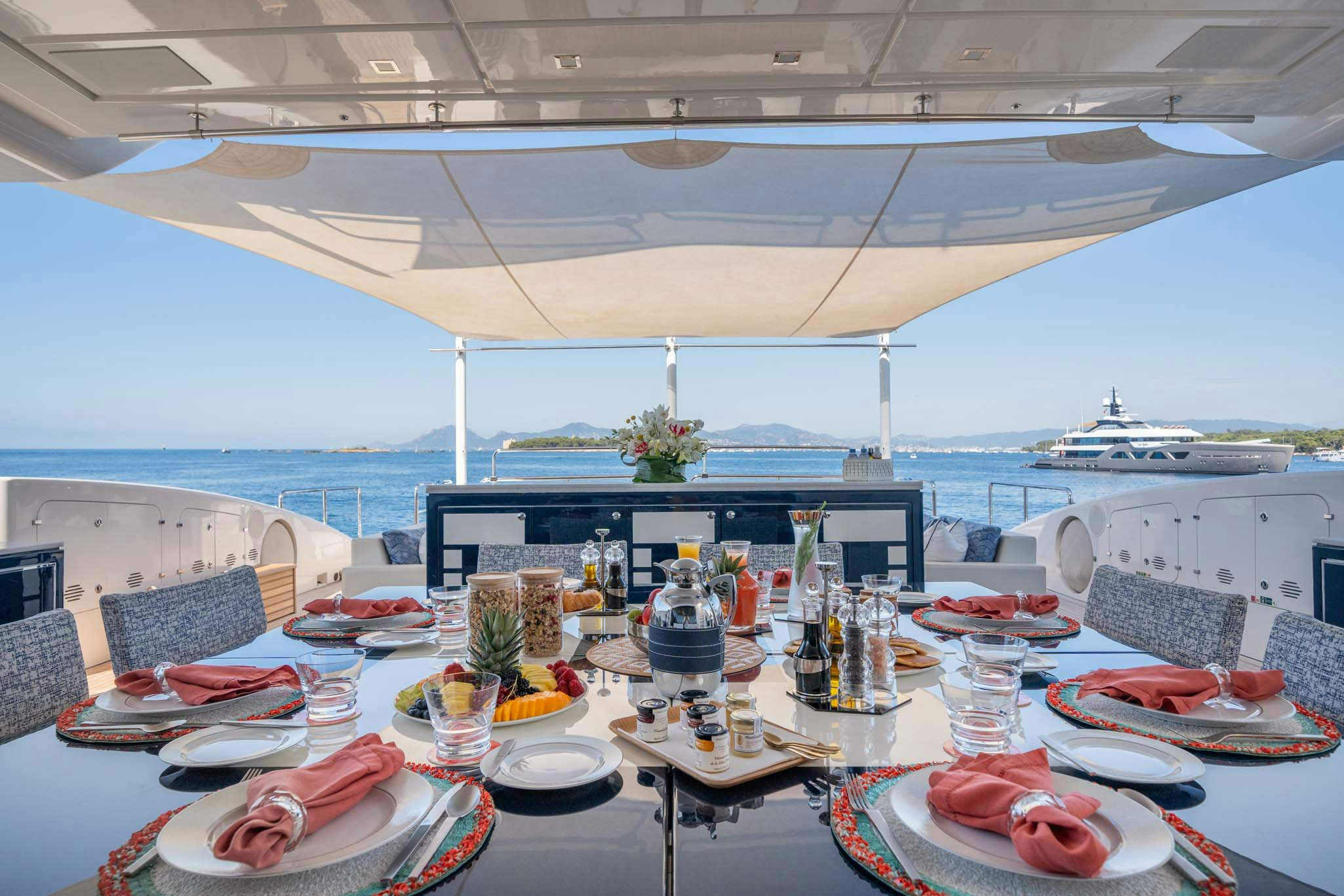 a table set for a meal aboard DA VINCI Yacht for Charter