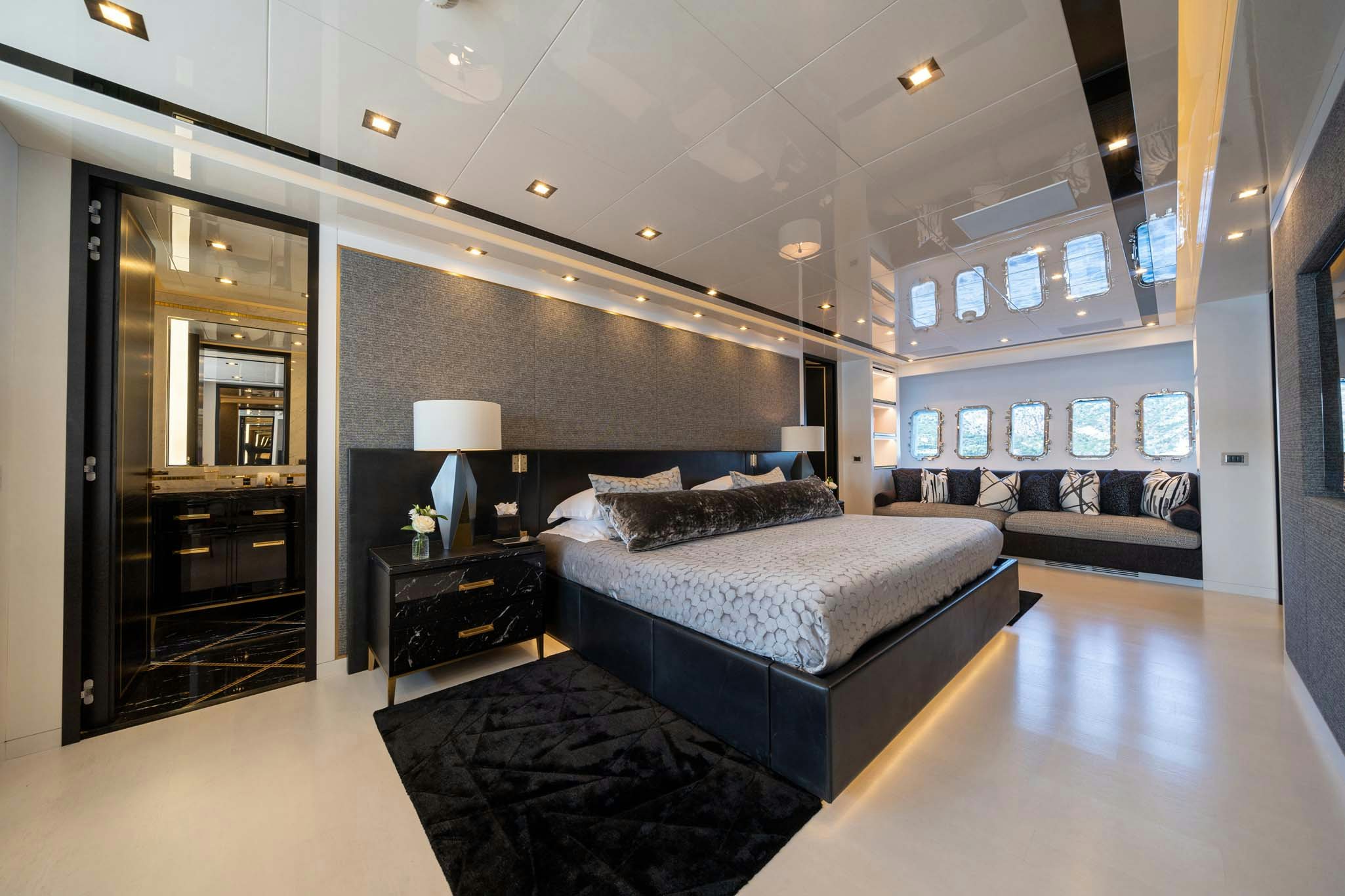 a large bedroom with a large bed aboard DA VINCI Yacht for Charter