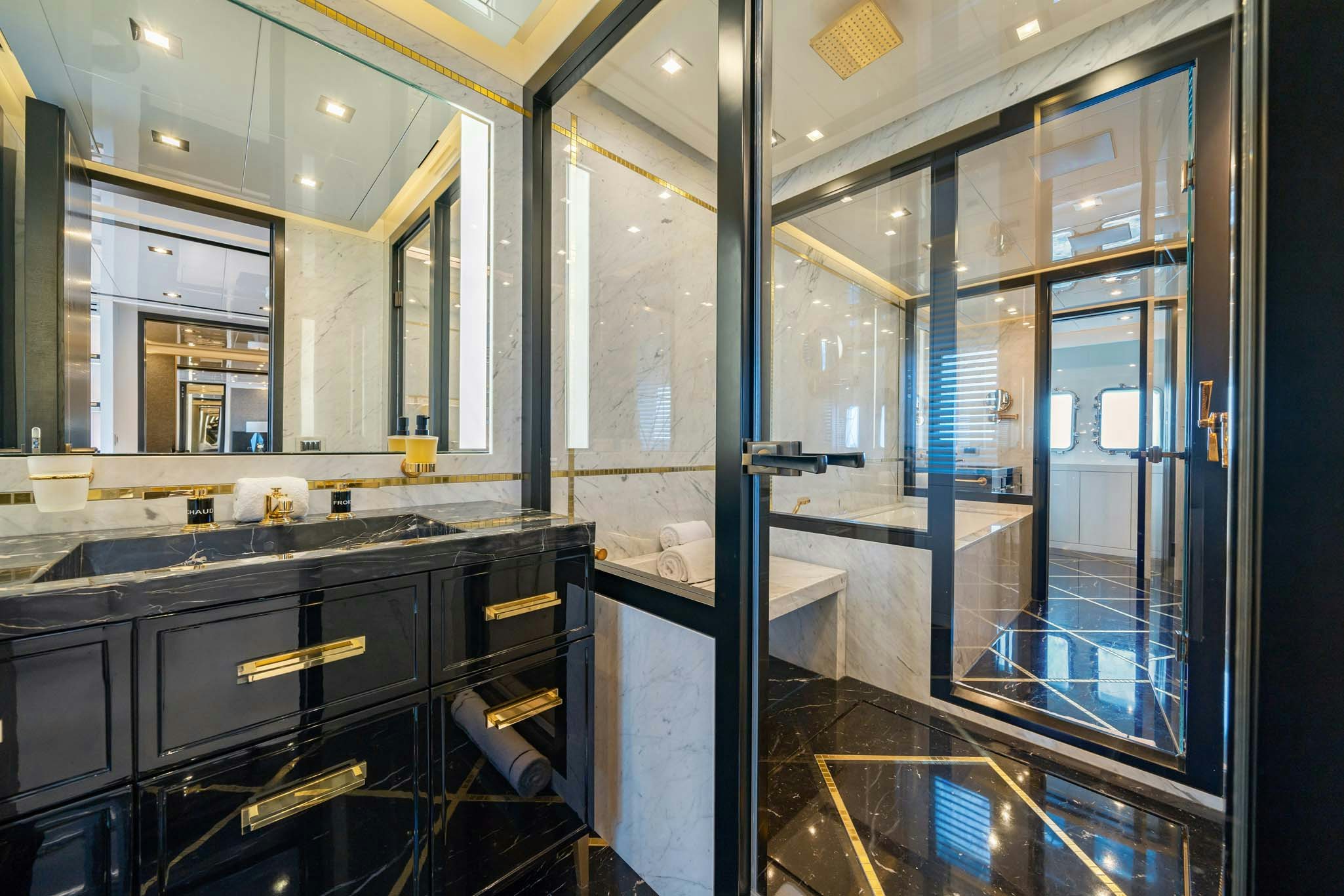 a large kitchen with glass walls aboard DA VINCI Yacht for Charter