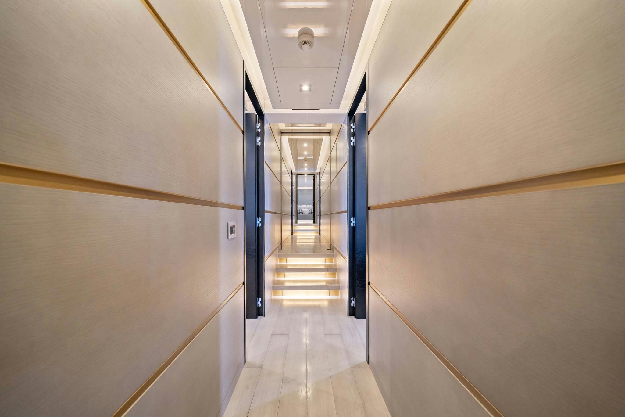 a hallway with doors aboard DA VINCI Yacht for Charter