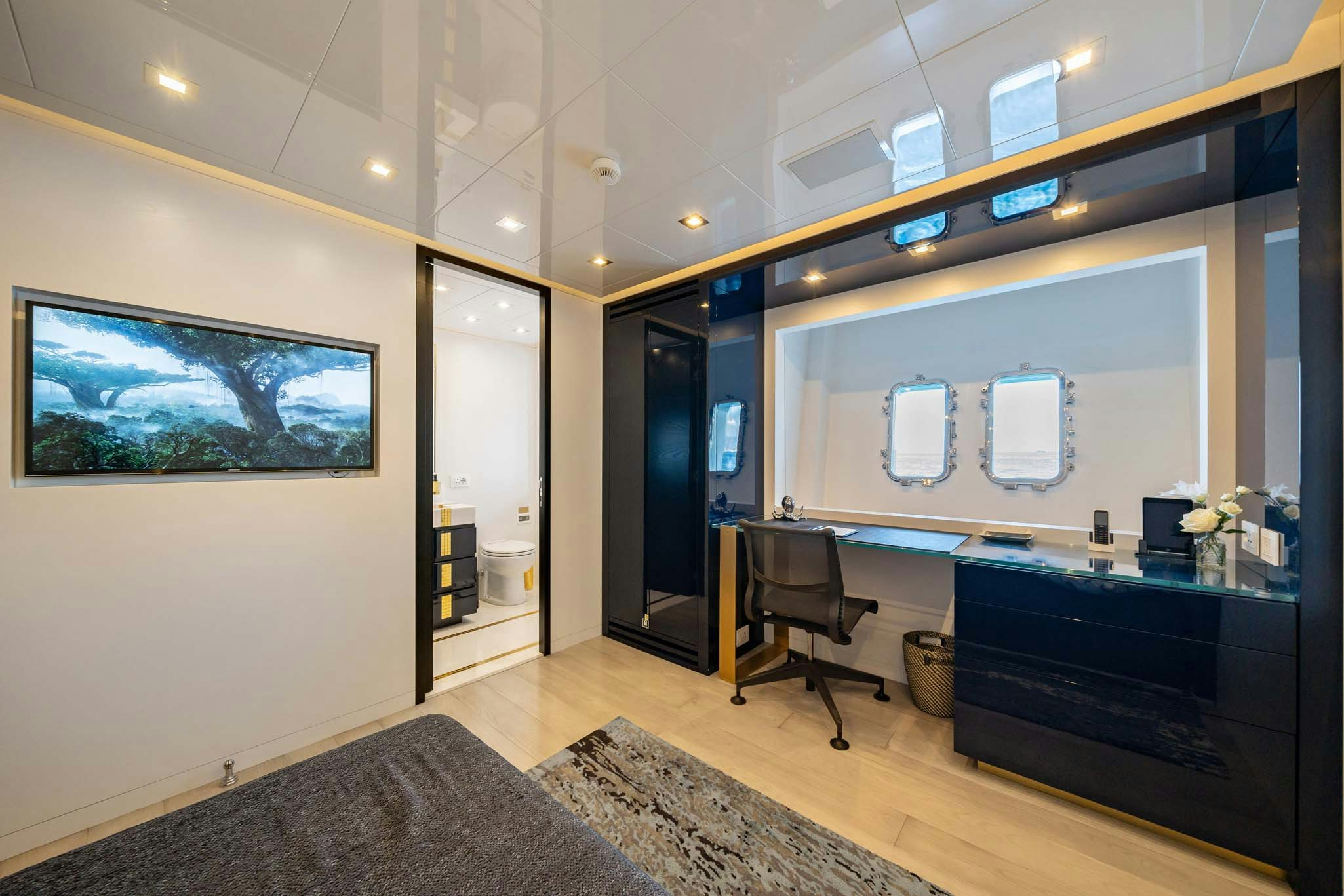 a room with a desk and a chair aboard DA VINCI Yacht for Charter