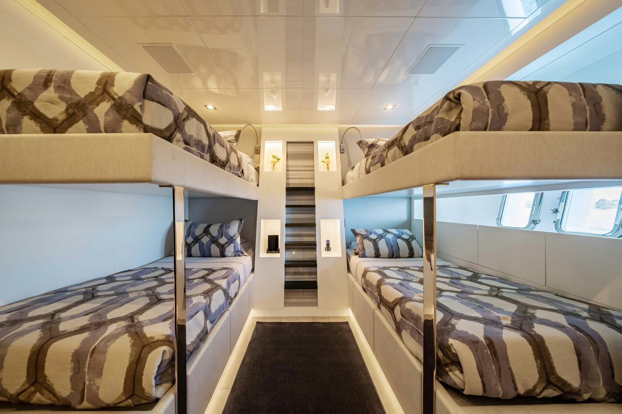a room with bunk beds aboard DA VINCI Yacht for Charter