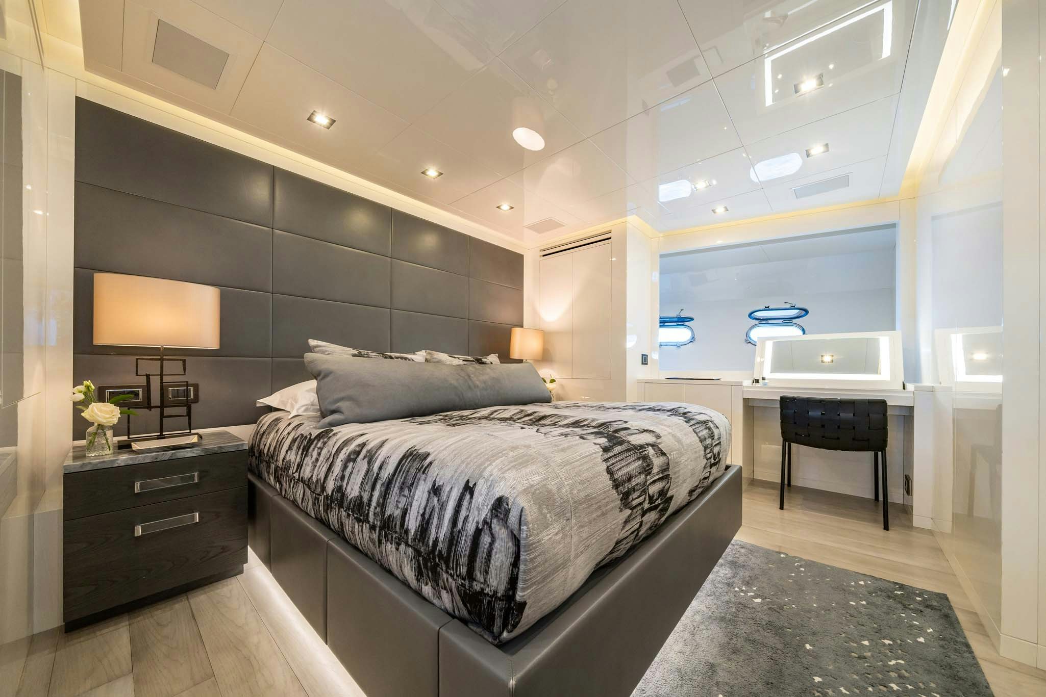 a bedroom with a large bed aboard DA VINCI Yacht for Charter