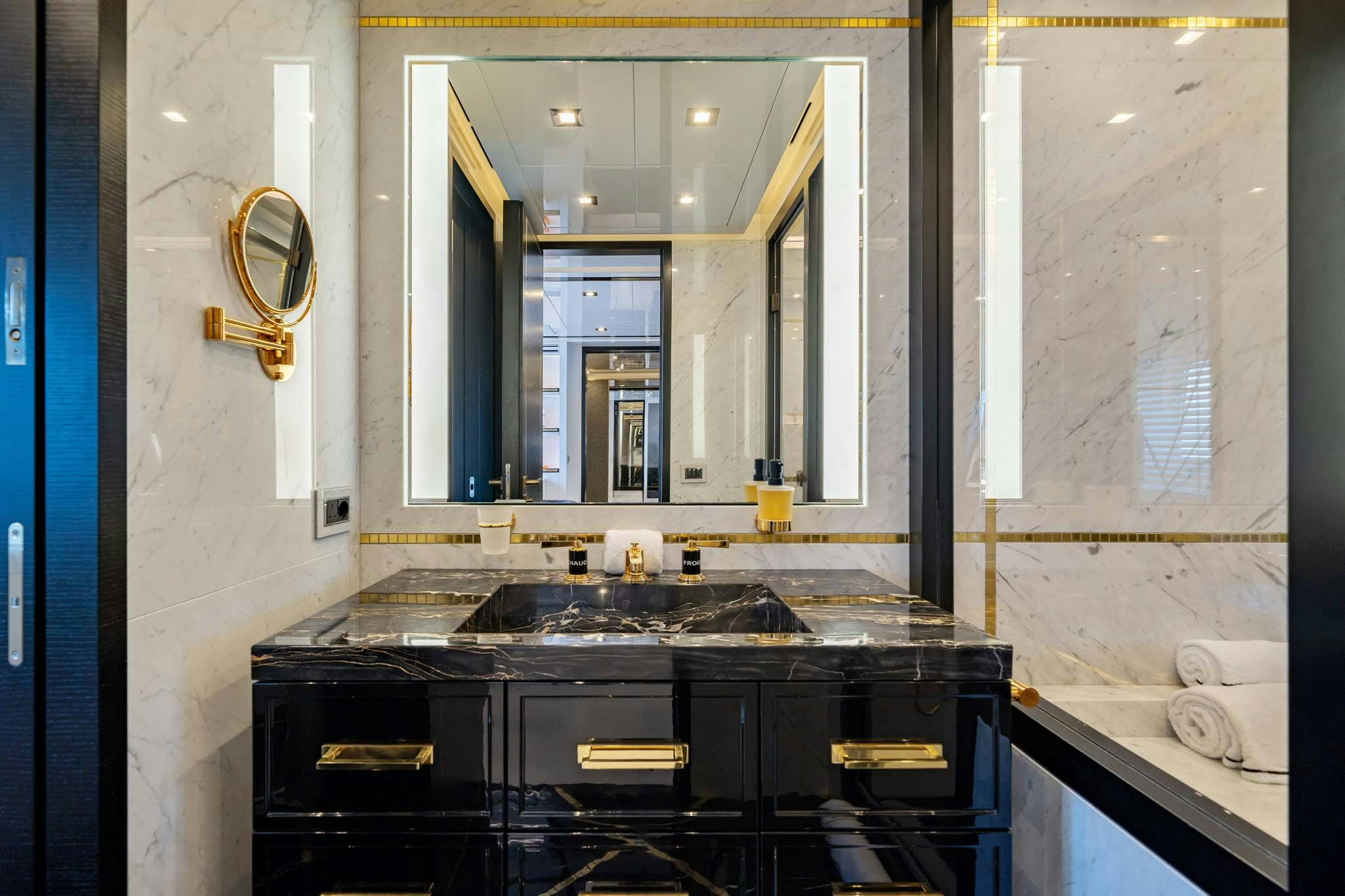 a kitchen with a large mirror aboard DA VINCI Yacht for Charter