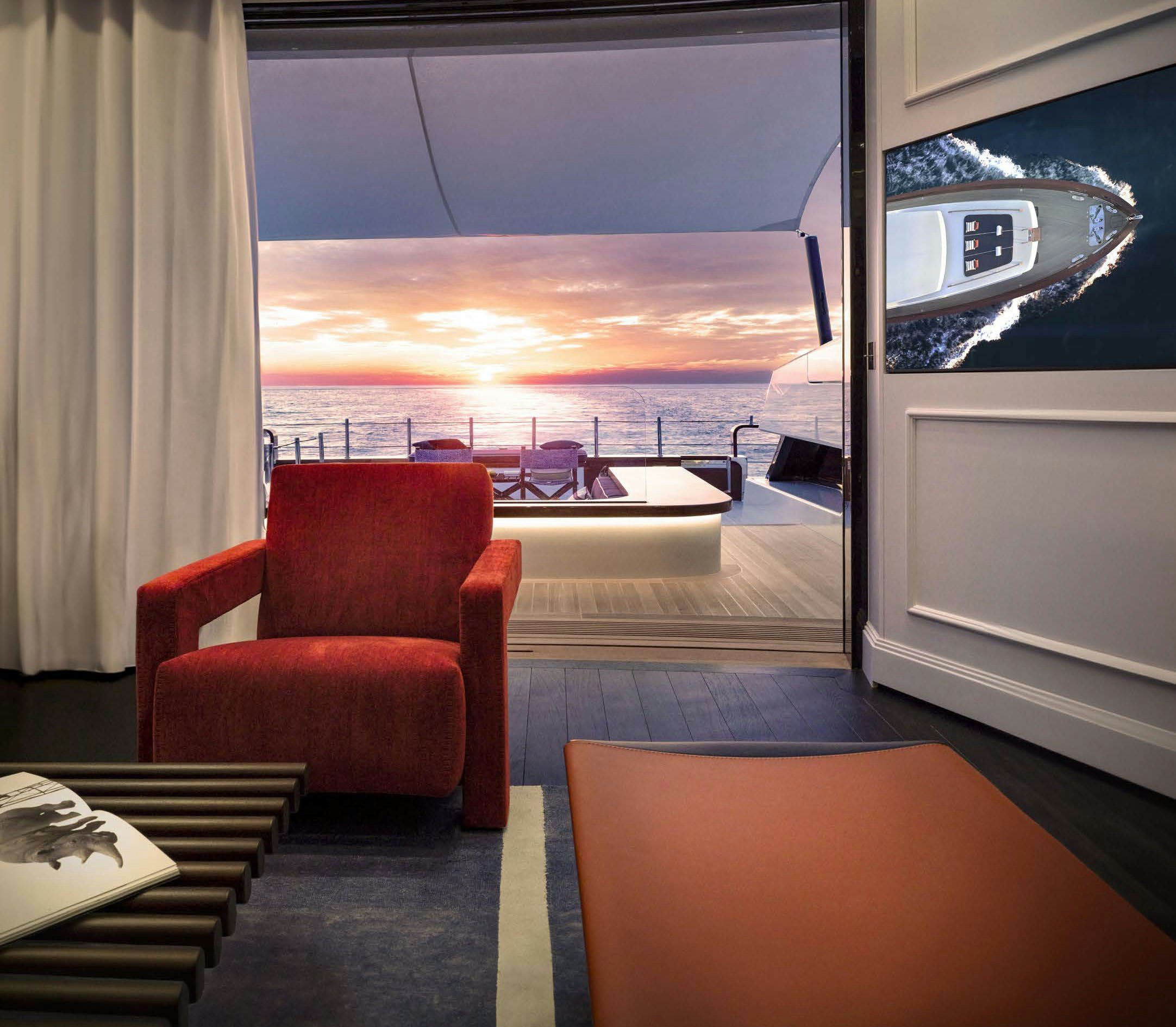 a room with a view of the ocean and a beach aboard PICCHIOTTI GENTLEMAN 24M Yacht for Sale