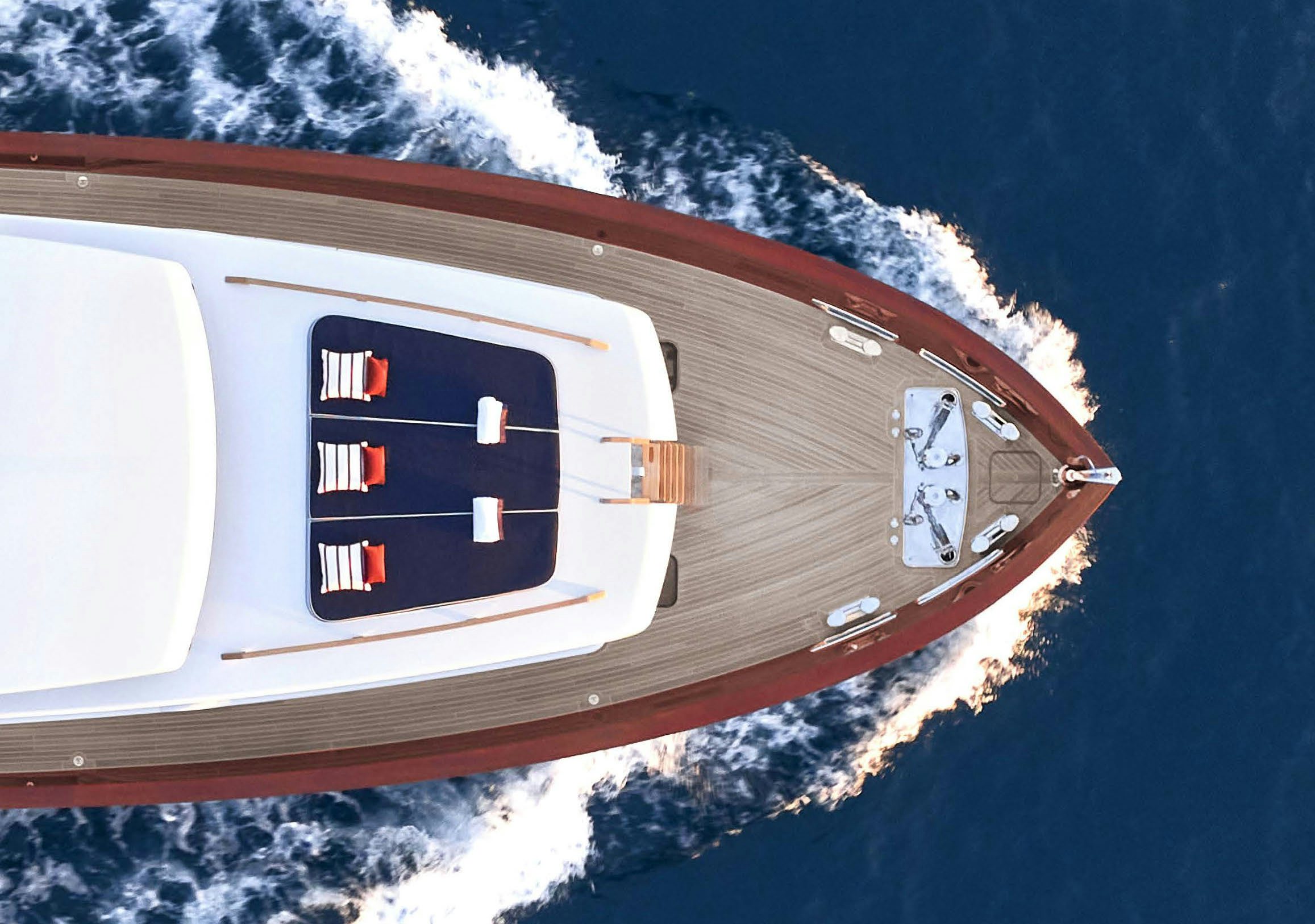 a white car with red text on it aboard PICCHIOTTI GENTLEMAN 24M Yacht for Sale