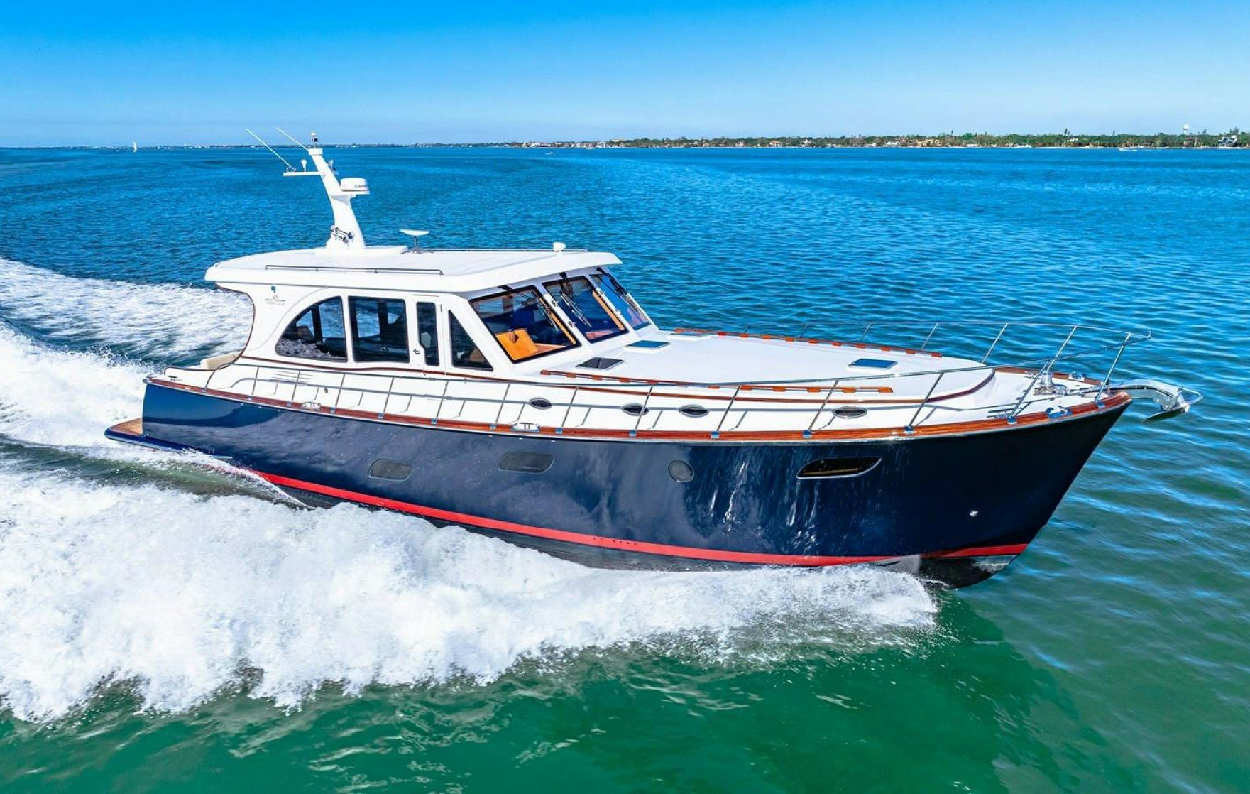 a boat on the water aboard ISLAND GIRL III Yacht for Sale