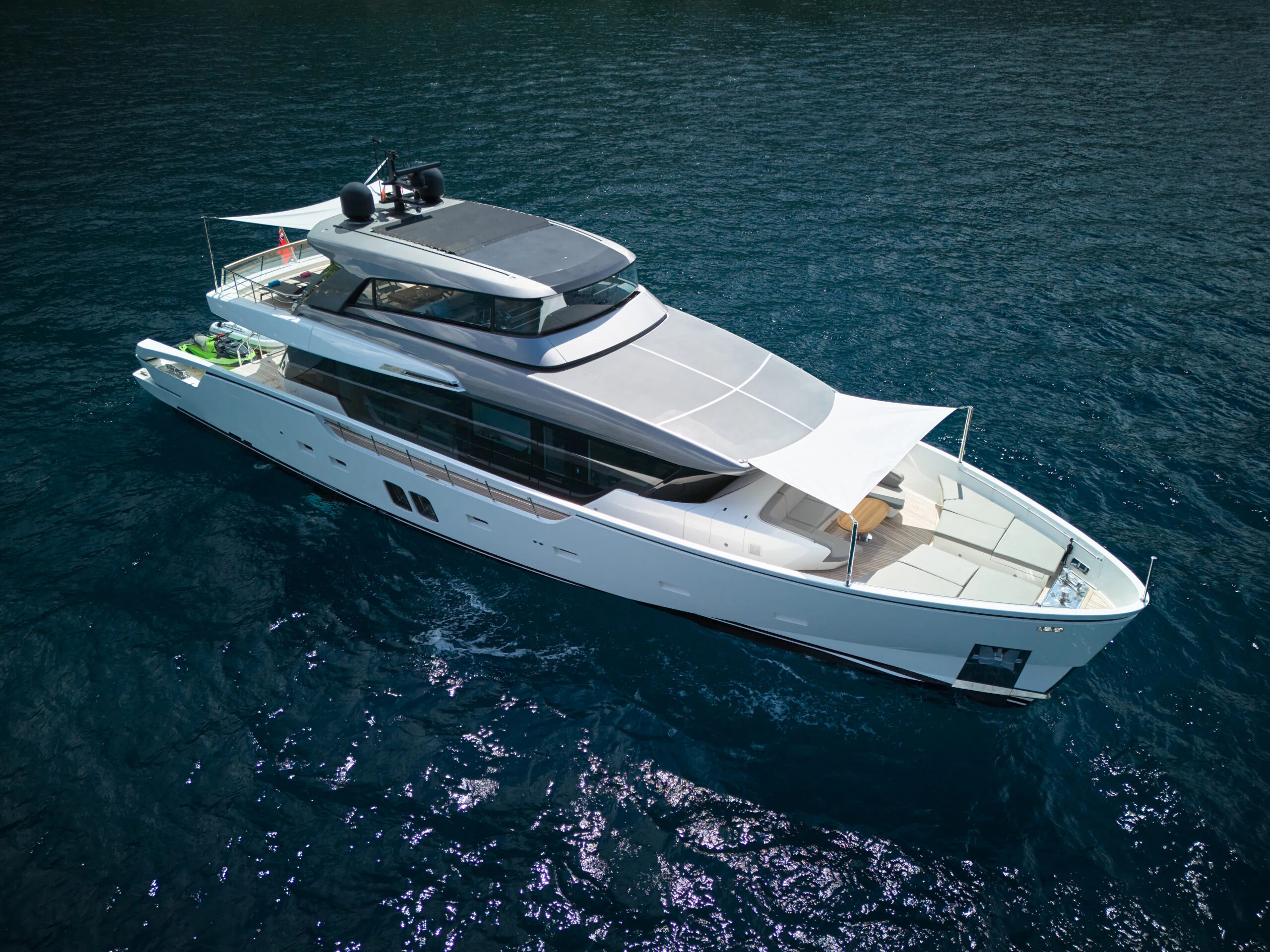 a white boat on the water aboard ZAFFIRO III Yacht for Sale