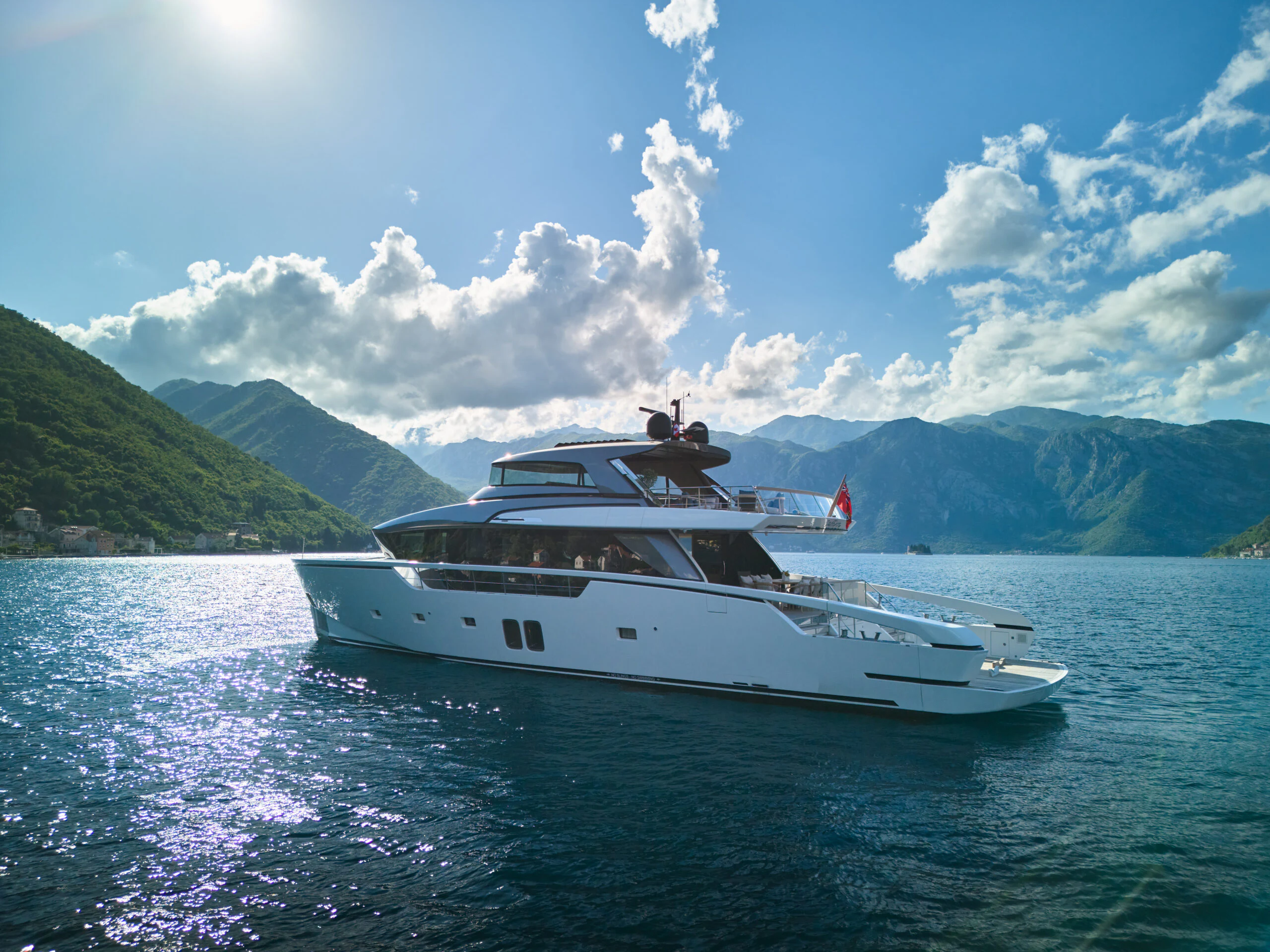 a white yacht on water aboard ZAFFIRO III Yacht for Sale