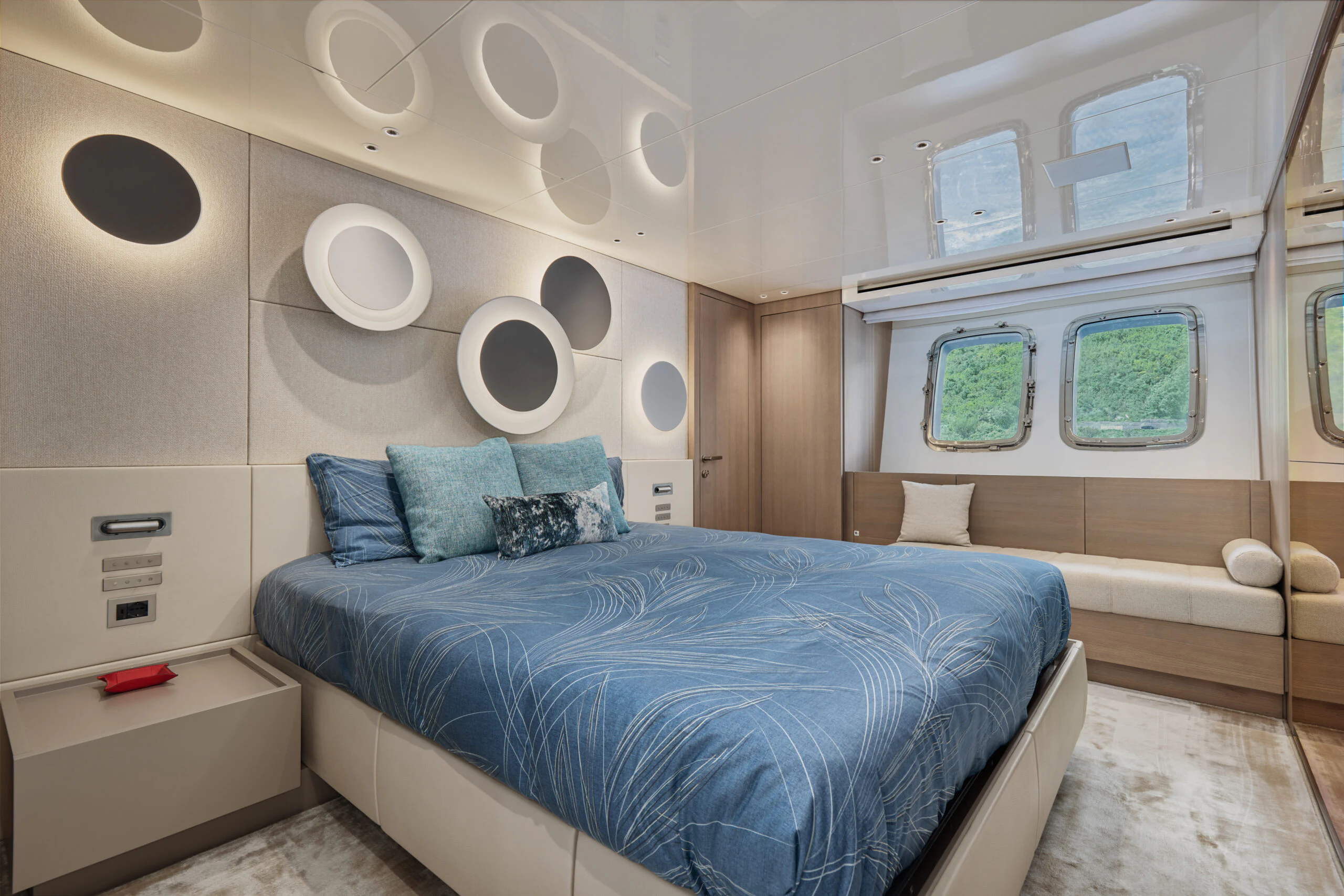 a bed in a room aboard ZAFFIRO III Yacht for Sale