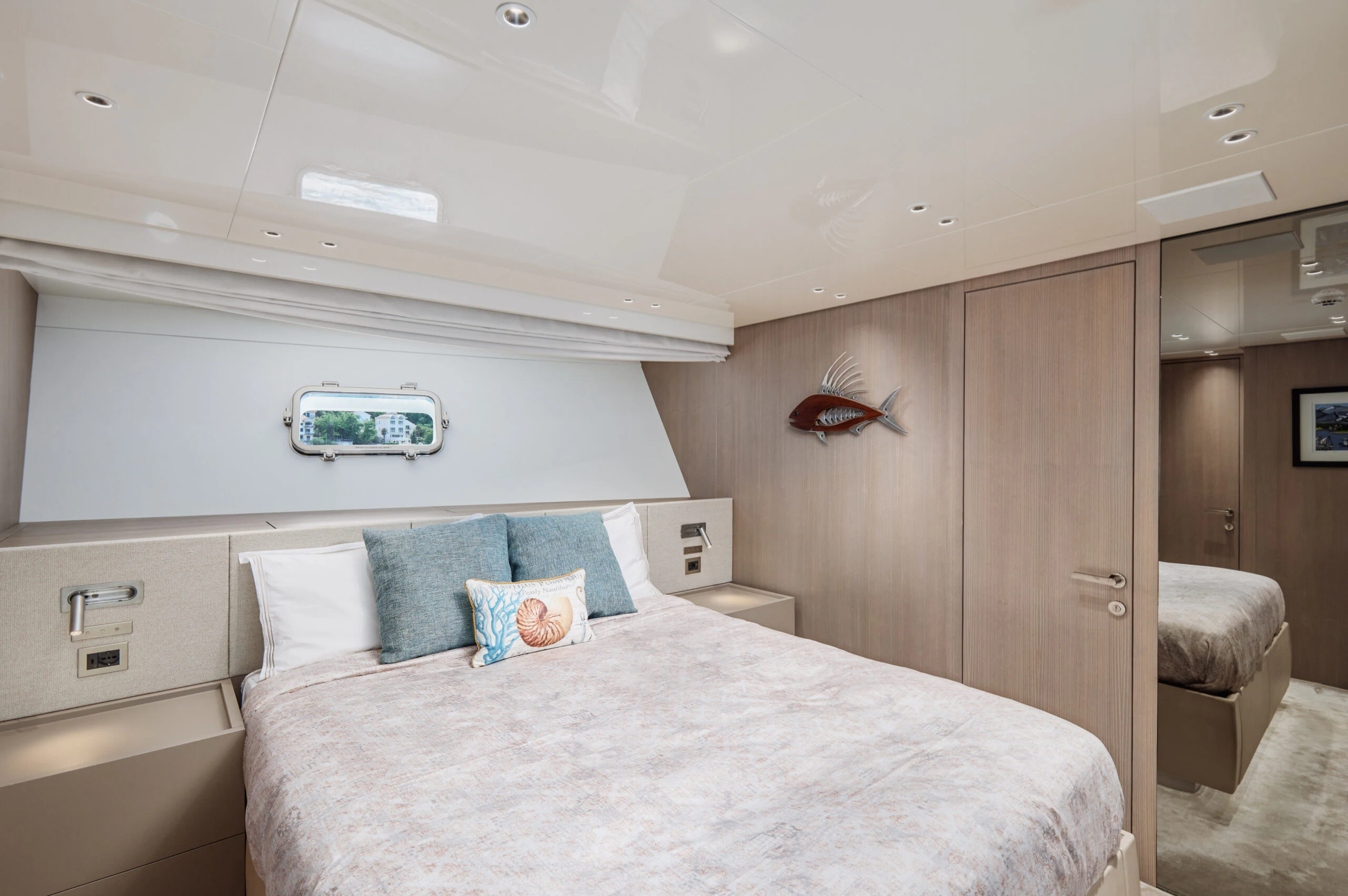 a bed in a room aboard ZAFFIRO III Yacht for Sale