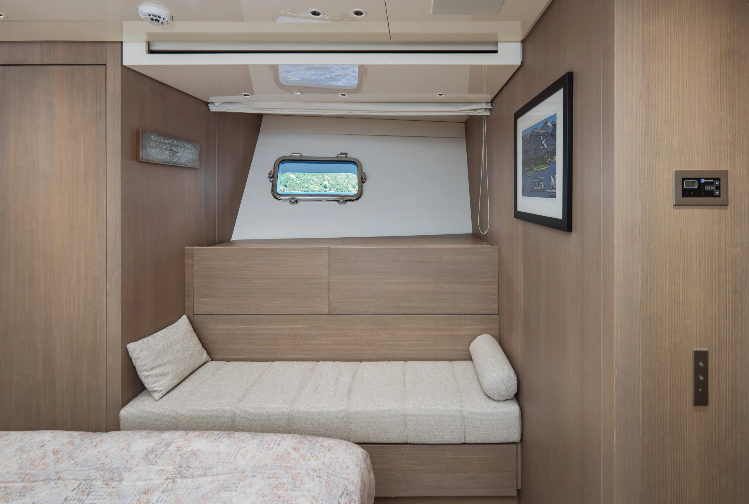 a room with a bed and a television aboard ZAFFIRO III Yacht for Sale