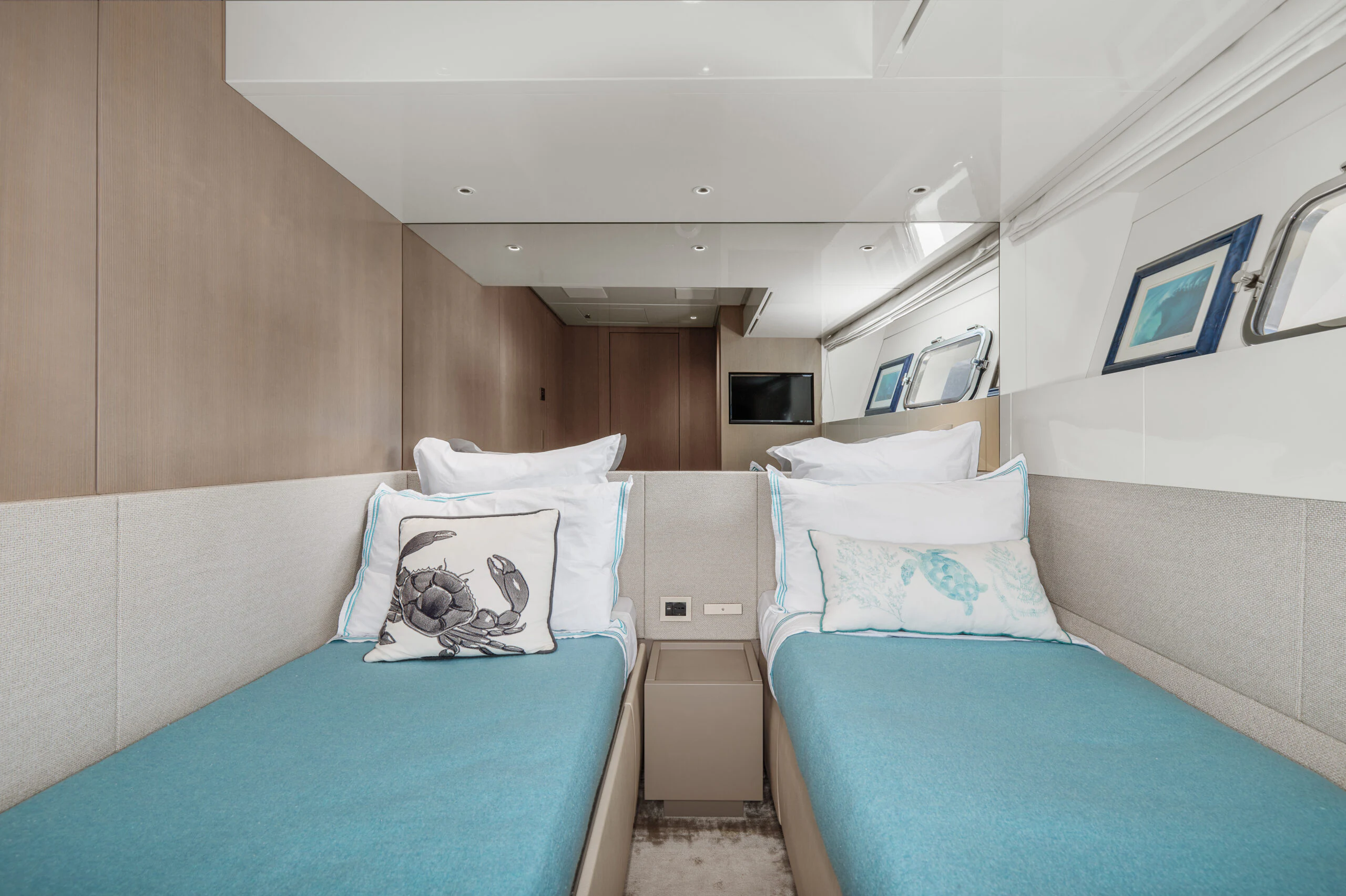 a room with a bed and a blue bed aboard ZAFFIRO III Yacht for Sale