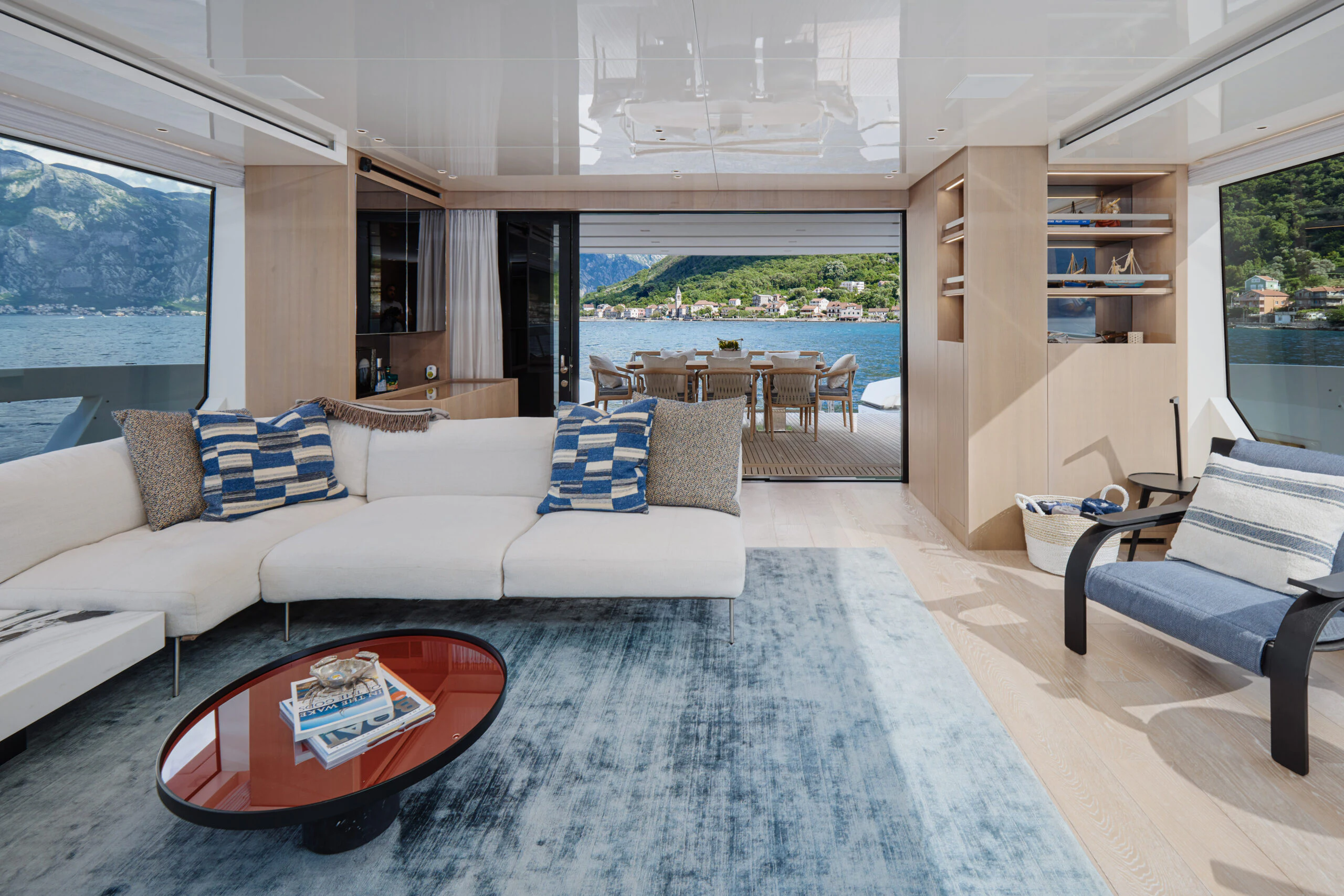a living room with a couch and a table aboard ZAFFIRO III Yacht for Sale