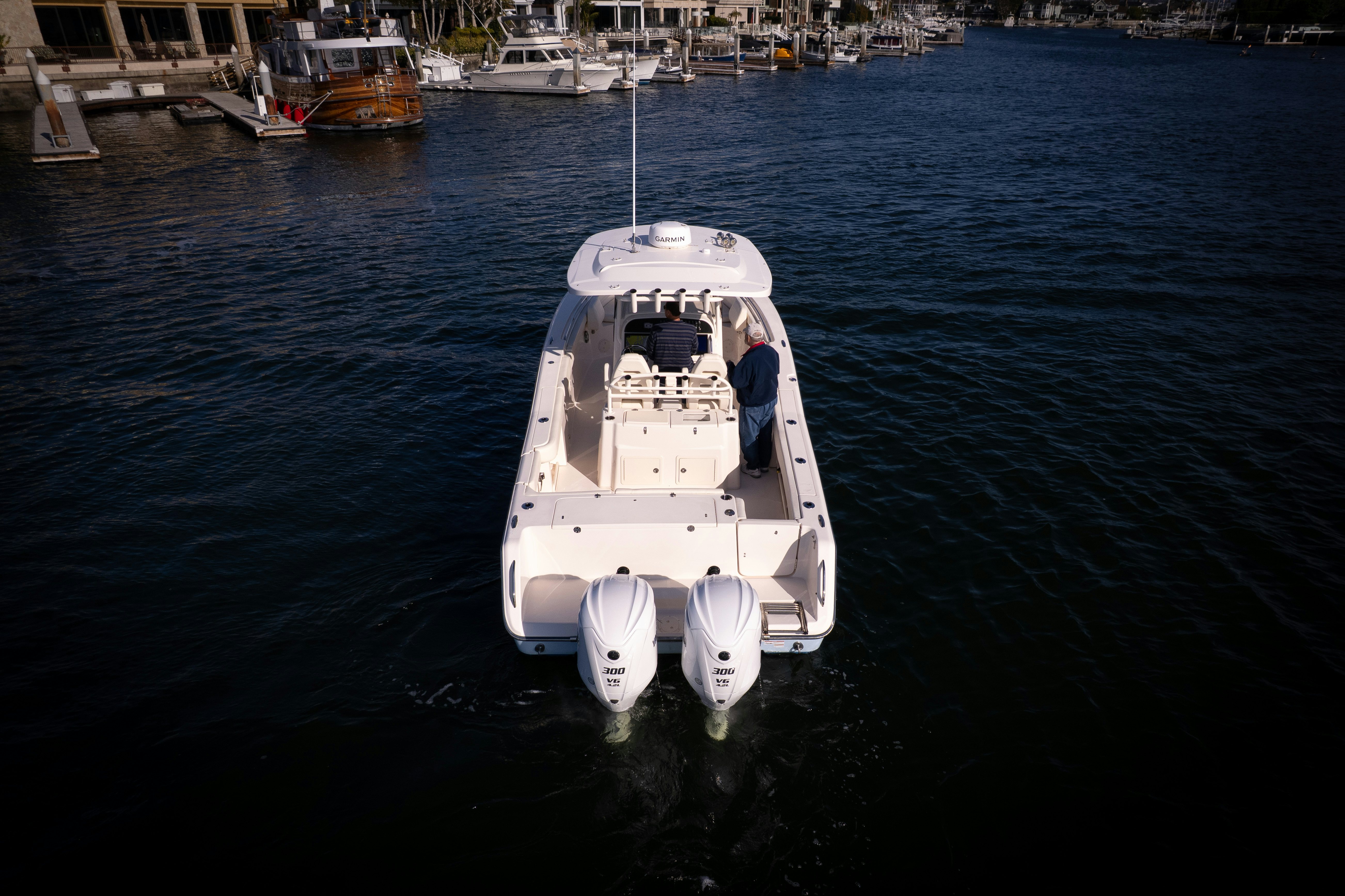 a white boat in the water aboard SHOOTER Yacht for Sale
