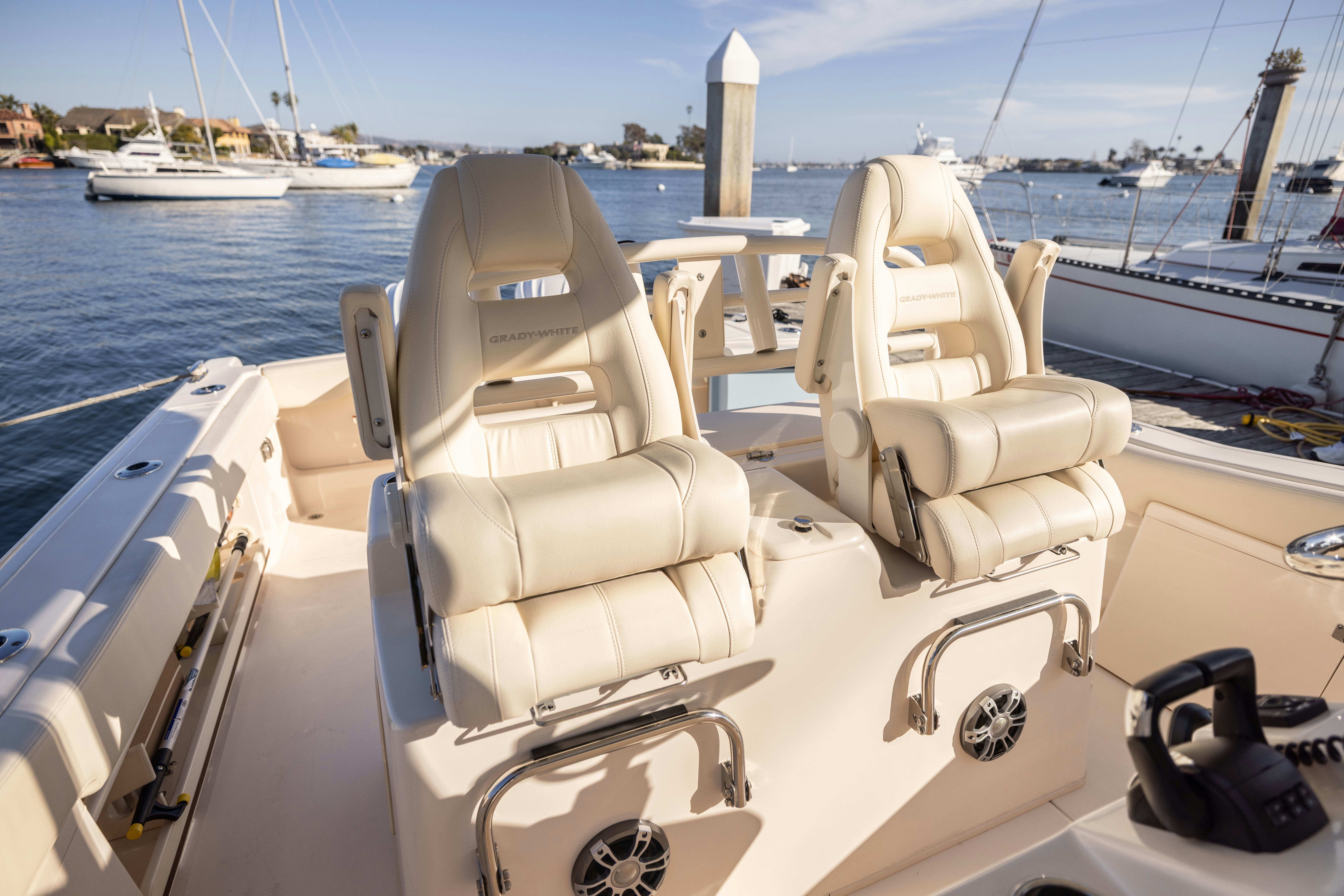 a white boat with seats on it aboard SHOOTER Yacht for Sale