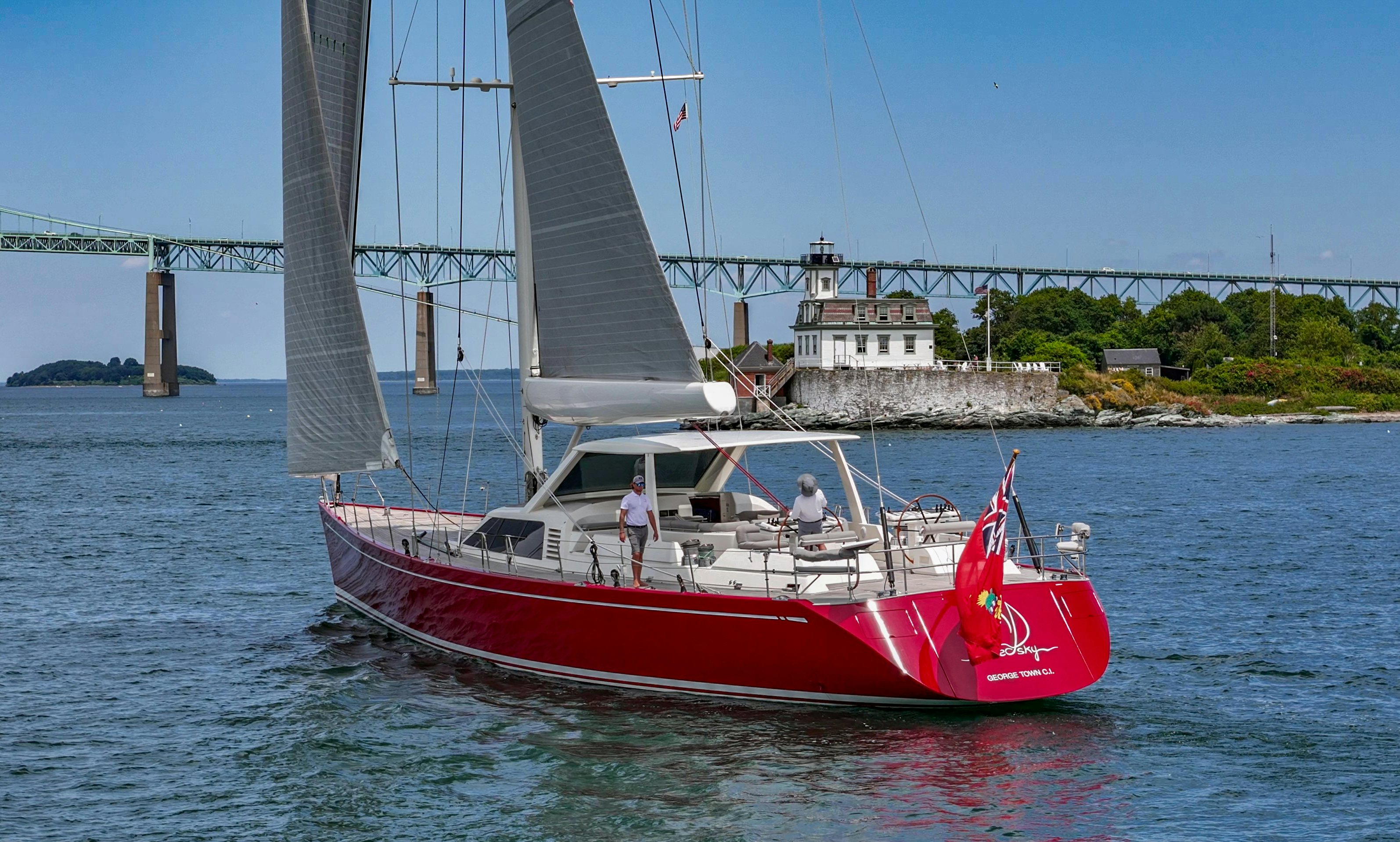 a boat sailing on the water aboard RED SKY Yacht for Sale