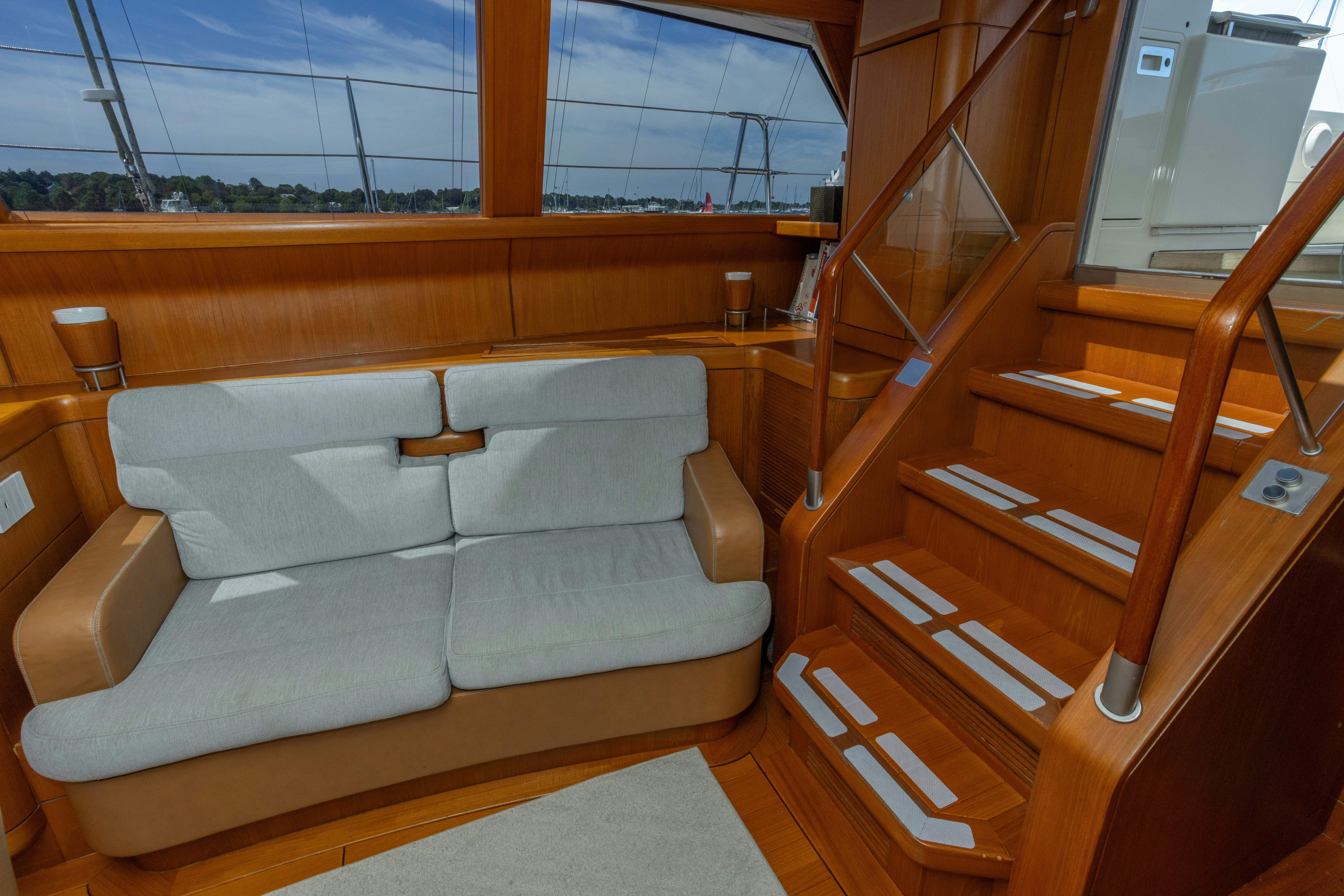 a couch in a room aboard RED SKY Yacht for Sale