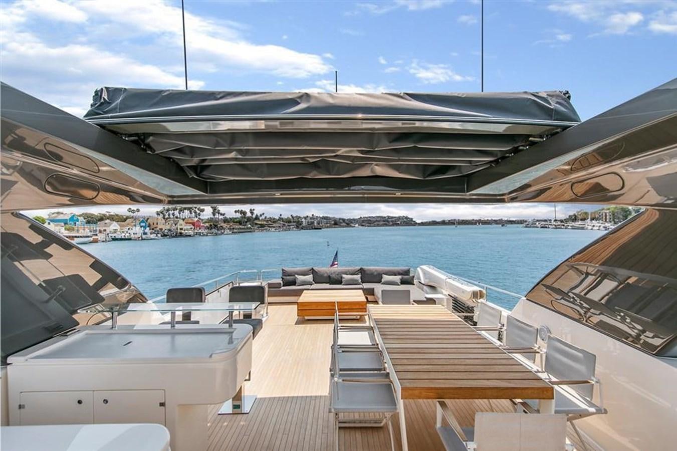 a deck of a boat on a body of water aboard LONTANO Yacht for Sale