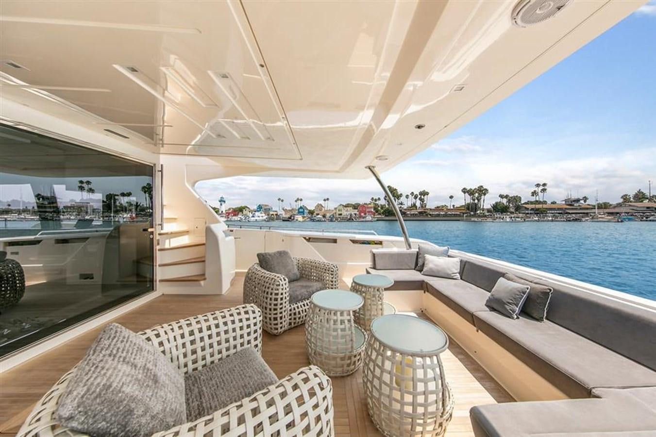 a large patio with a large pool aboard LONTANO Yacht for Sale