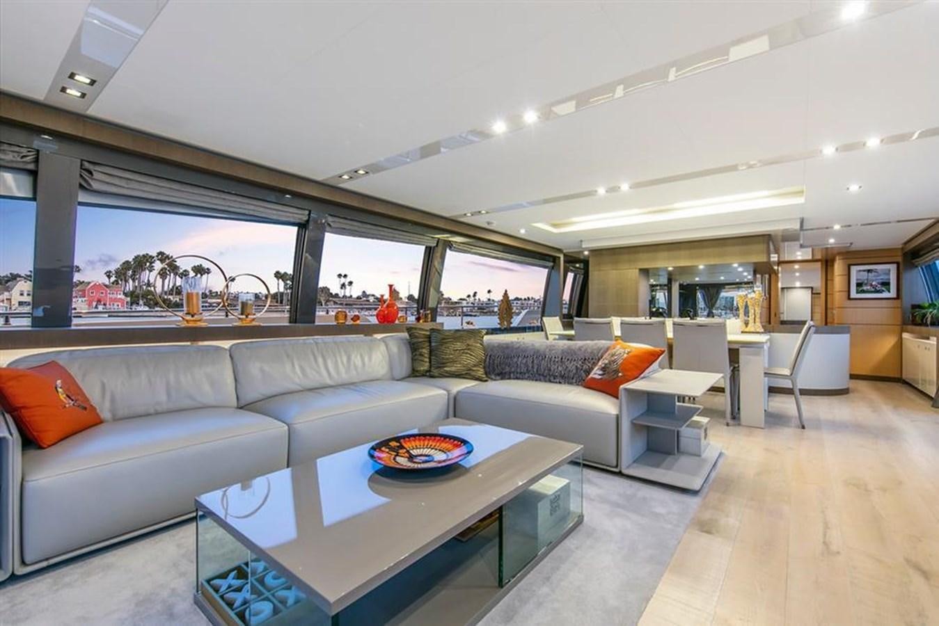 a living room with a large window aboard LONTANO Yacht for Sale