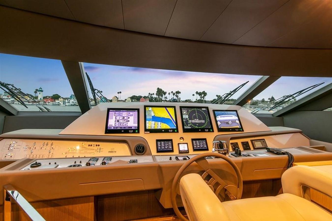 inside of a vehicle with many screens aboard LONTANO Yacht for Sale