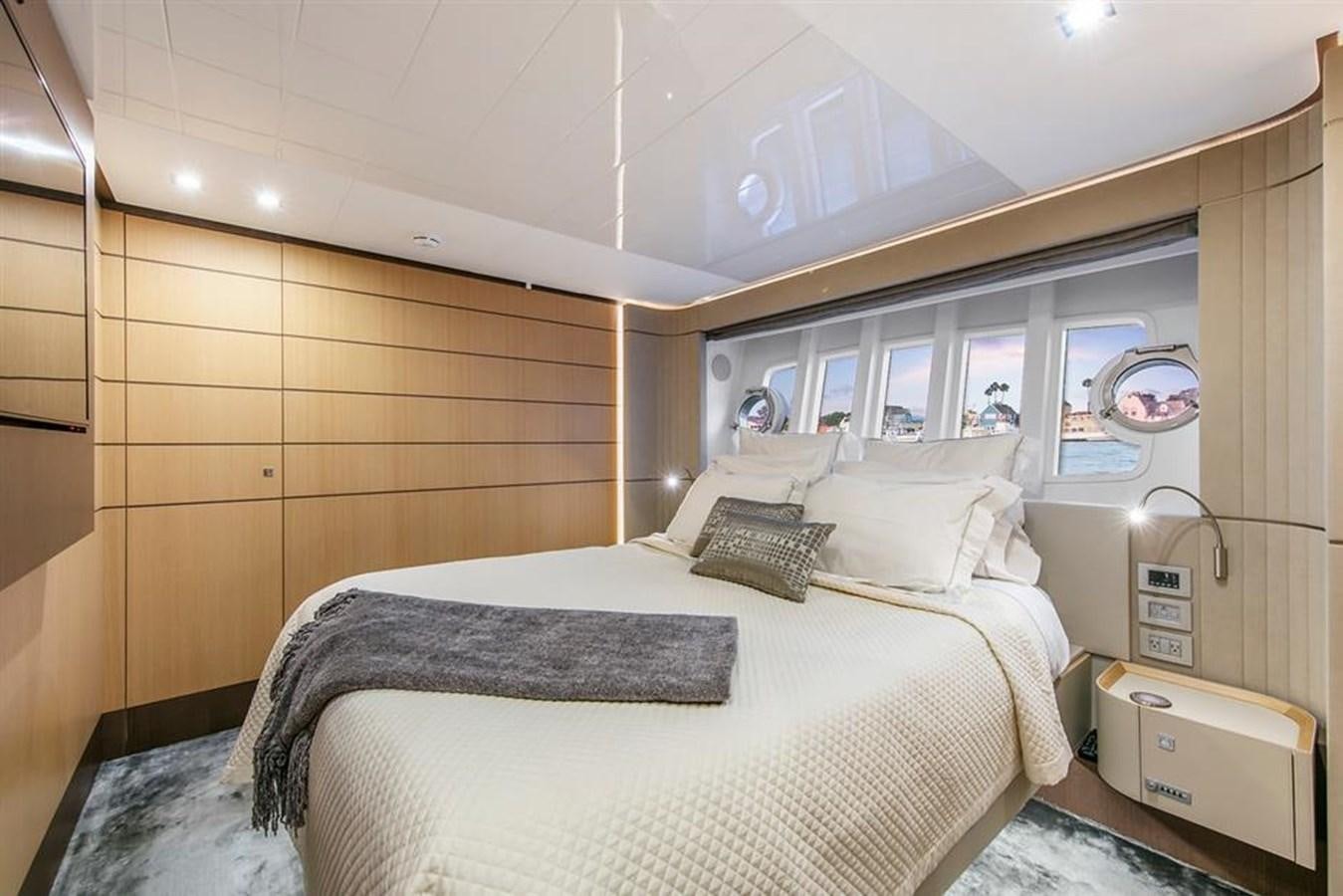 a room with two beds aboard LONTANO Yacht for Sale