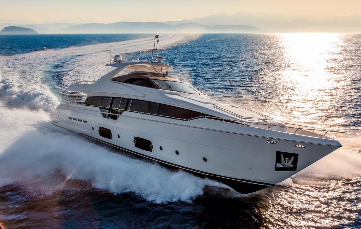 a white yacht on the water aboard LONTANO Yacht for Sale