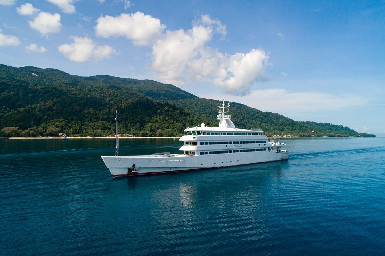 a large white ship in the water aboard ASEAN LADY Yacht for Sale