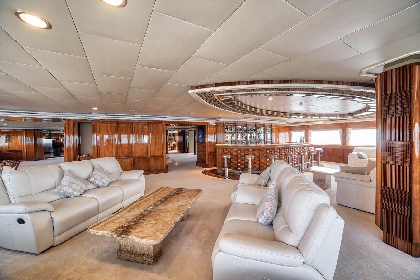a living room with a large open floor plan aboard ASEAN LADY Yacht for Sale