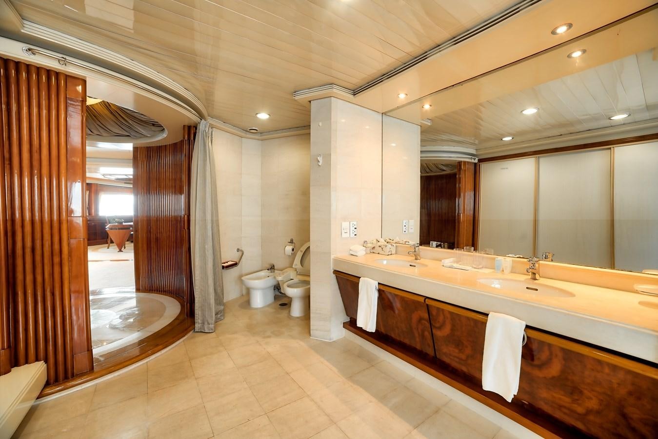 a bathroom with a large mirror aboard ASEAN LADY Yacht for Sale