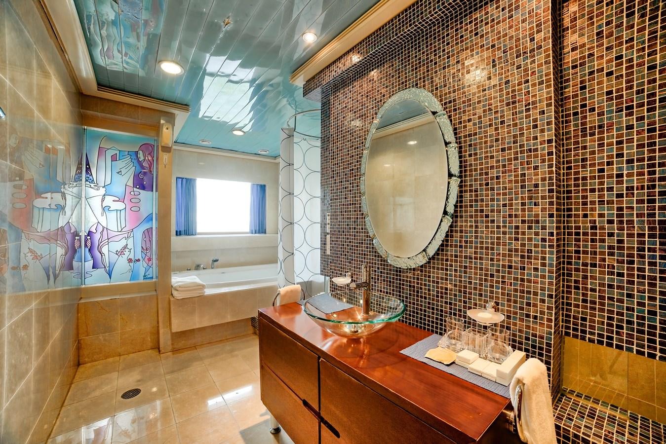 a bathroom with a large mirror aboard ASEAN LADY Yacht for Sale