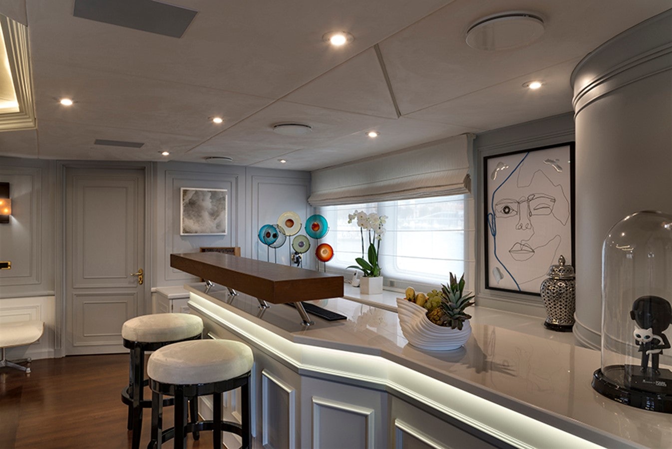 a large kitchen with a large island aboard CHAKRA Yacht for Charter