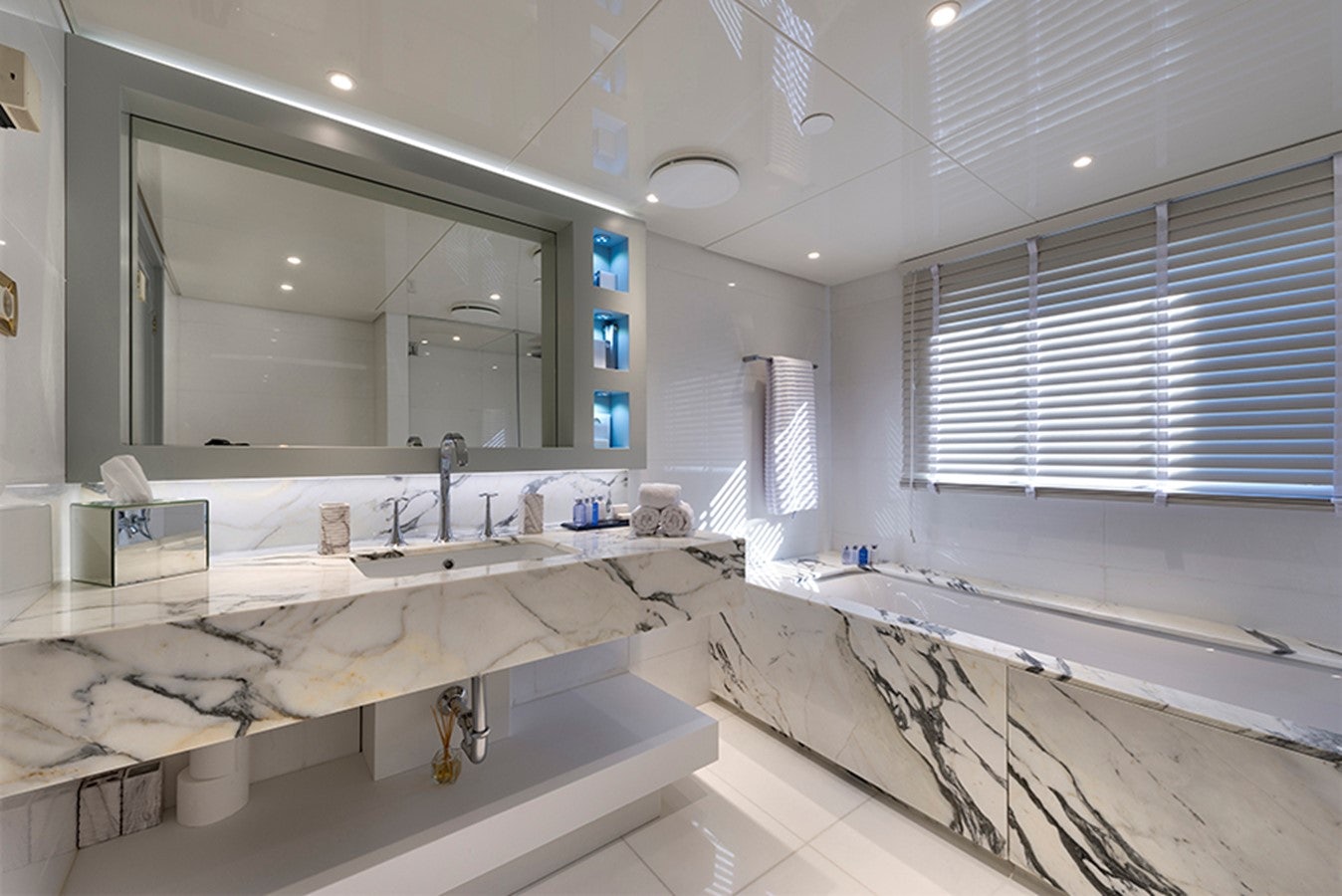 a bathroom with sinks and mirrors aboard CHAKRA Yacht for Charter