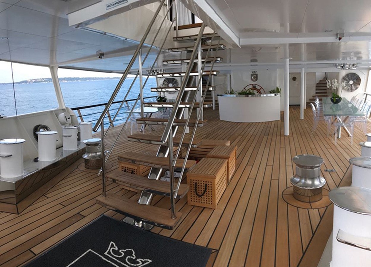 a ladder on a wood floor aboard CHAKRA Yacht for Charter
