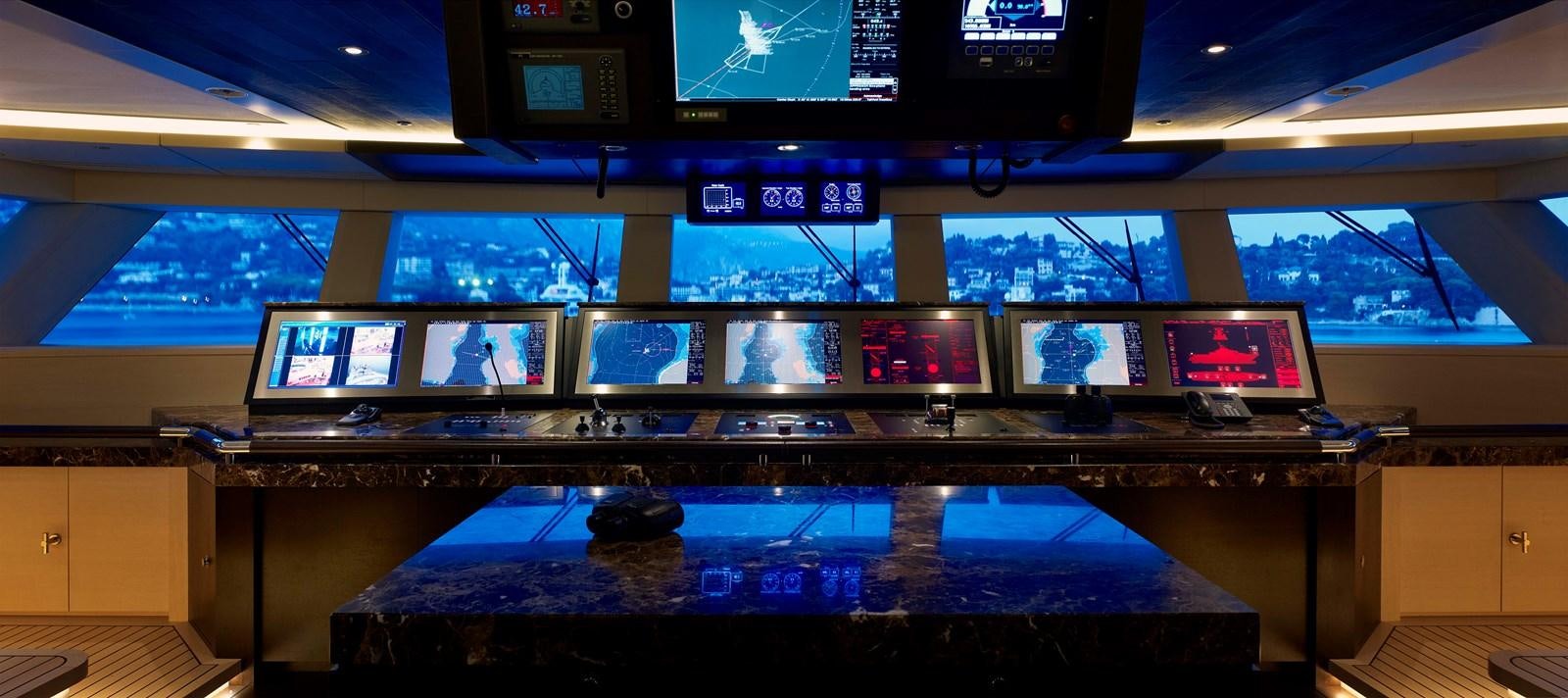 a pool table with screens aboard DRAAK Yacht for Sale