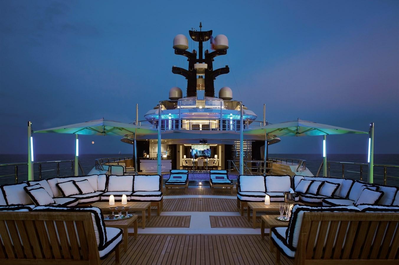 a large ship in a harbor aboard DRAAK Yacht for Sale