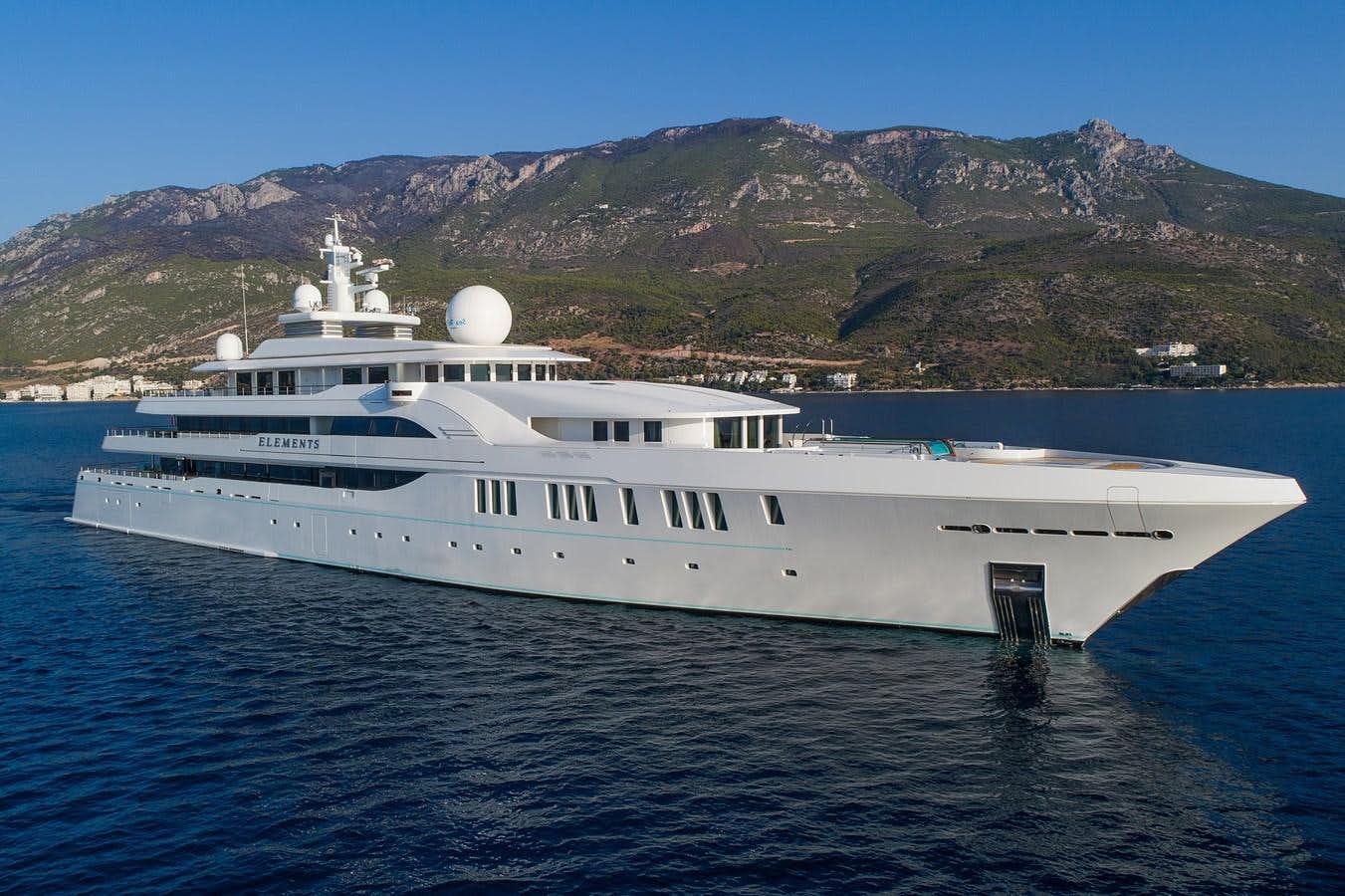 a large white yacht in the water aboard ELEMENTS Yacht for Sale
