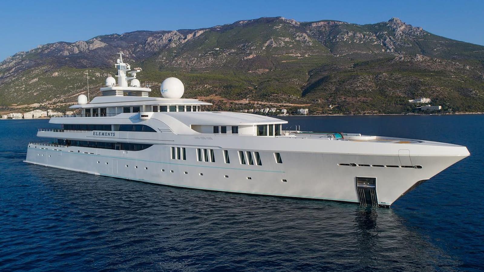 a large white yacht in the water aboard ELEMENTS Yacht for Sale