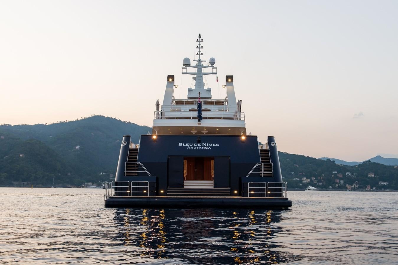 a large ship in the water aboard BLEU DE NIMES Yacht for Sale