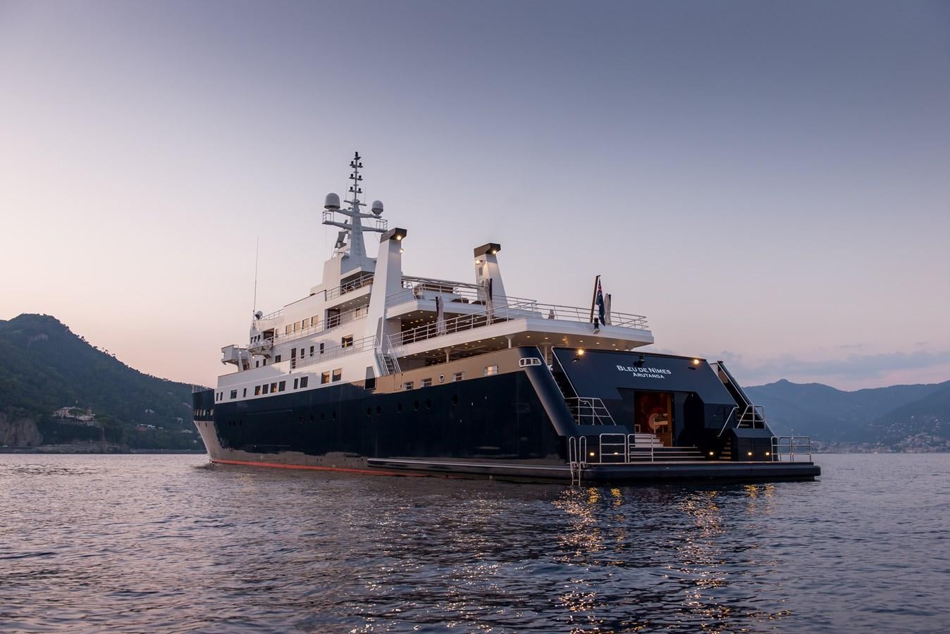 a large ship in the water aboard BLEU DE NIMES Yacht for Sale