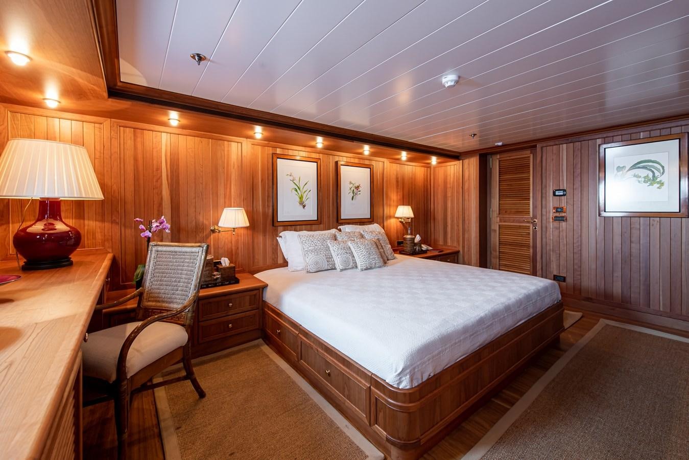a large bed in a room aboard BLEU DE NIMES Yacht for Sale