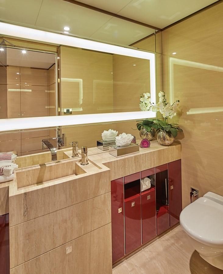 a bathroom with red and white tiles aboard ALMAX Yacht for Charter