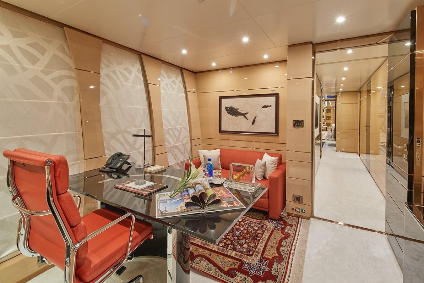 a room with a table and chairs aboard ALMAX Yacht for Charter