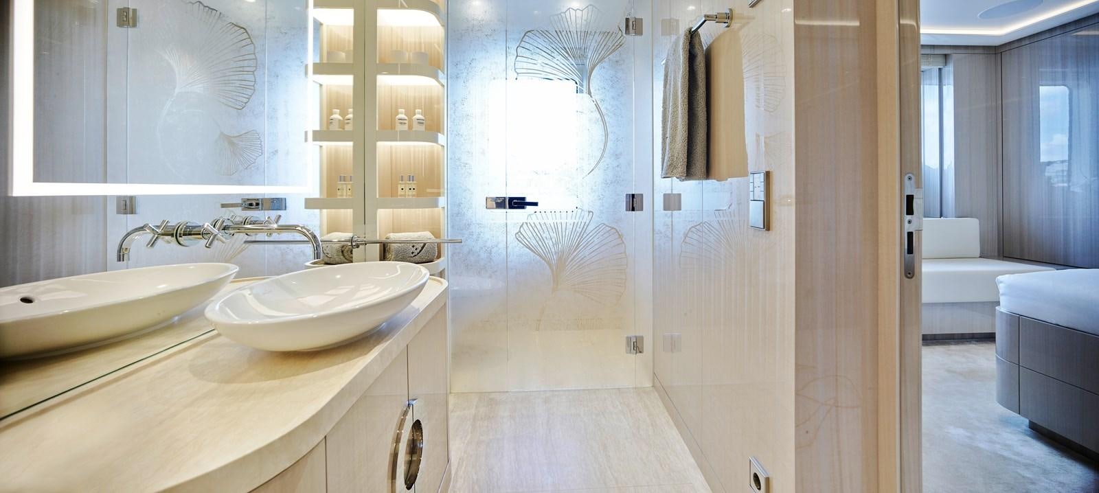 a bathroom with a sink and bathtub aboard STARLUST Yacht for Sale
