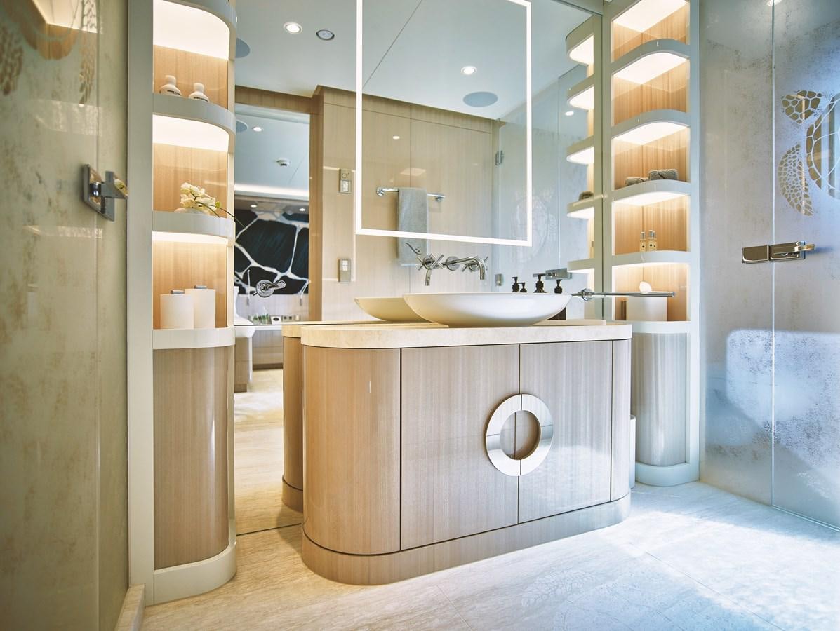 a bathroom with a sink and a mirror aboard STARLUST Yacht for Sale